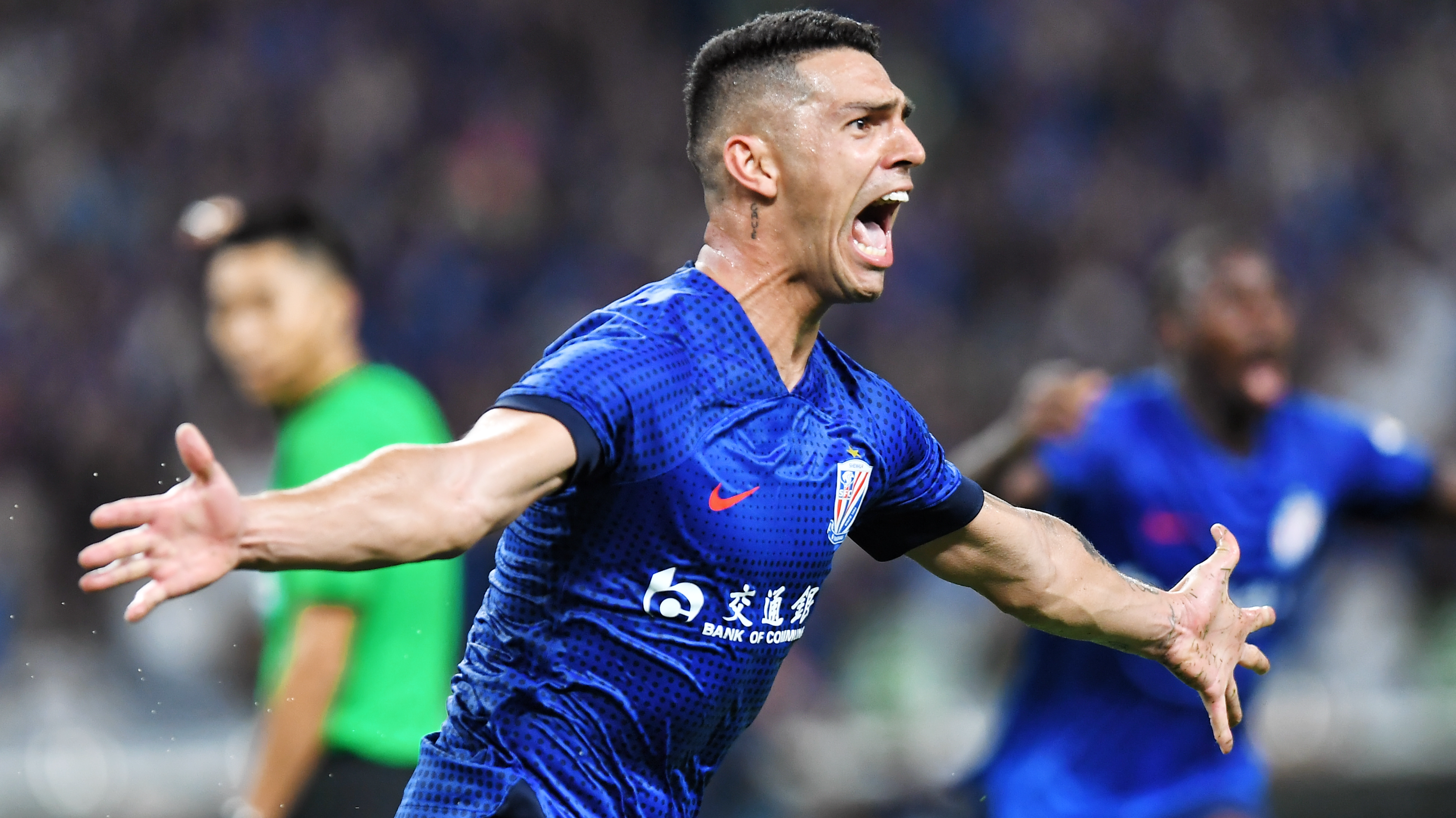 Andre Luis (C) celebrates after scoring in a Chinese Super League match against Shanghai Port, Shanghai, China, August 17, 2024. / IC Photo