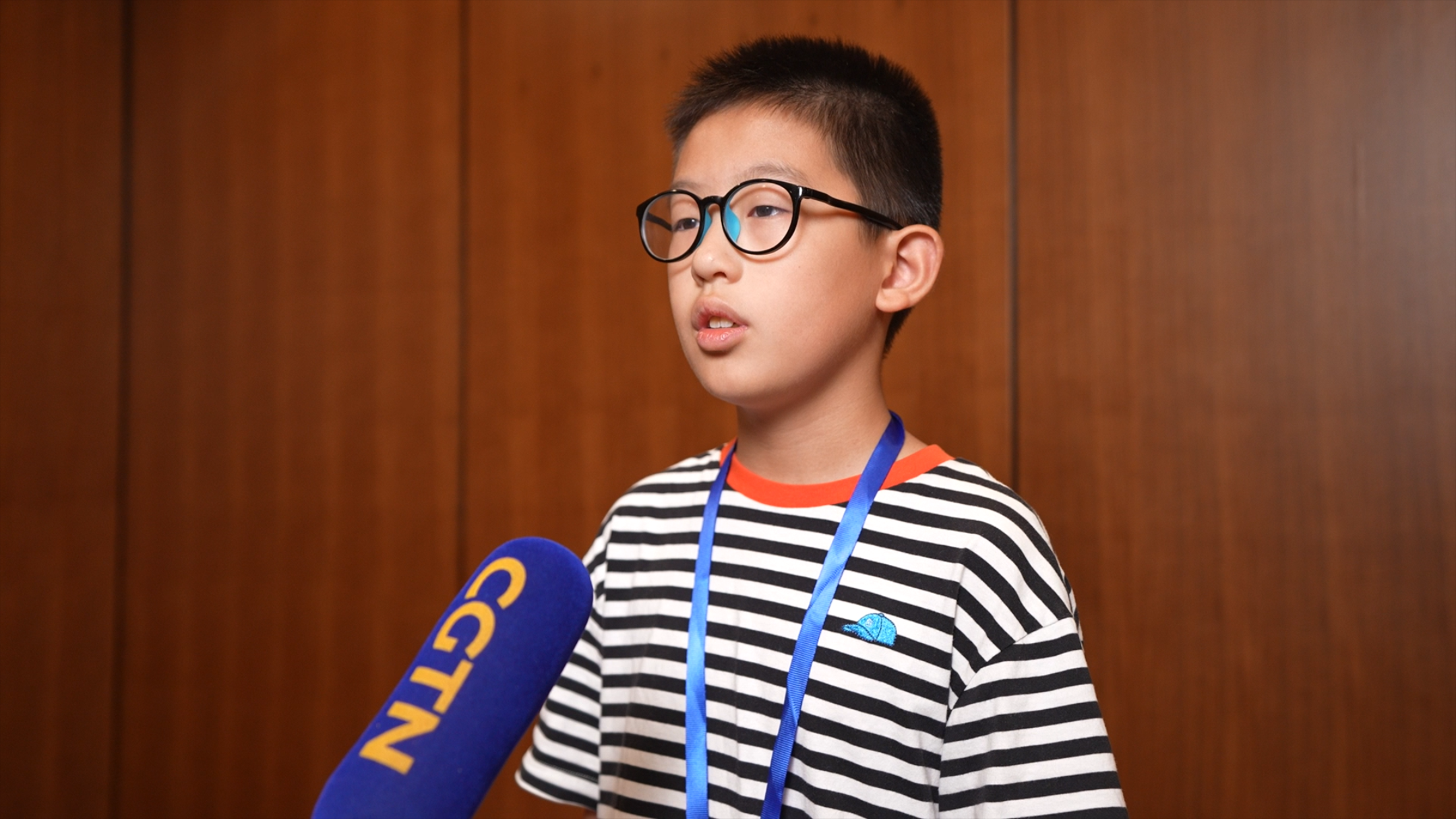 Yang Yuzhou, 10, in an interview after receiving the first prize in the seventh Zhixin Cup National AI Robot Competition in Beijing, China, August 16, 2024. /CGTN