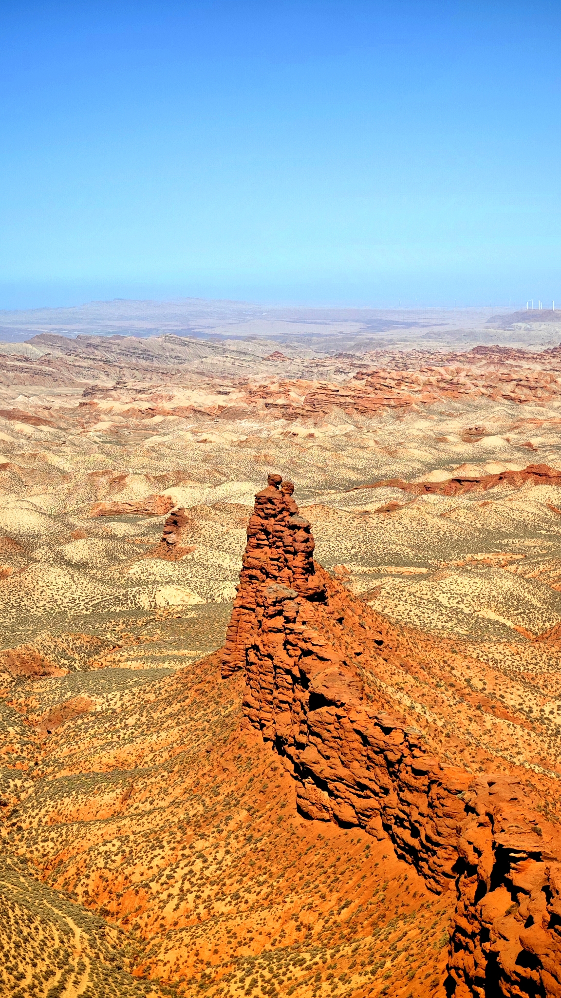 This photo taken on August 17, 2024 shows a towering red rock formation at Pingshanhu Grand Canyon in Zhangye, Gansu Province. /CFP