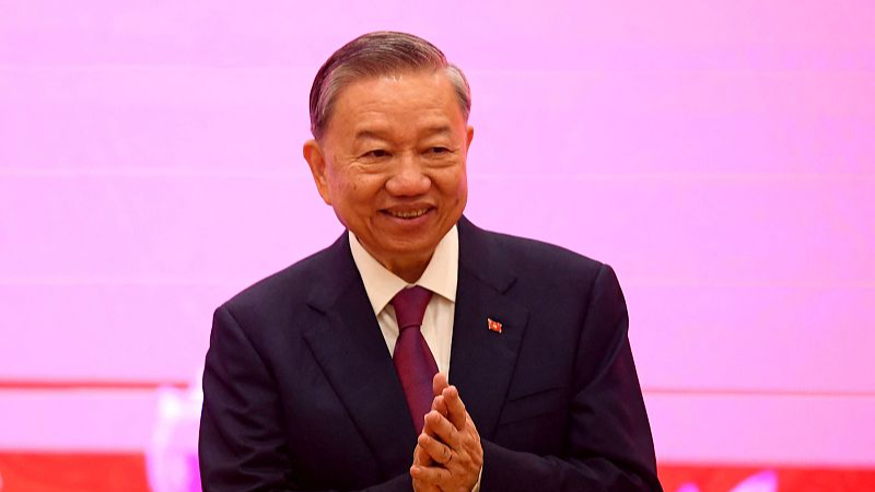 To Lam, general secretary of the Communist Party of Vietnam Central Committee and Vietnamese president, claps during a press conference at the National Convention Center in Hanoi, Vietnam, August 3, 2024. /CFP