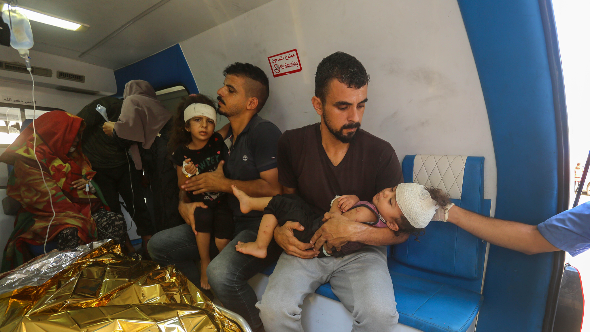 Injured Palestinian children brought to Aqsa Hospital to receive emergency treatment after Israeli forces hit Nuseirat camp, central Gaza Strip on August 16, 2024. /CFP