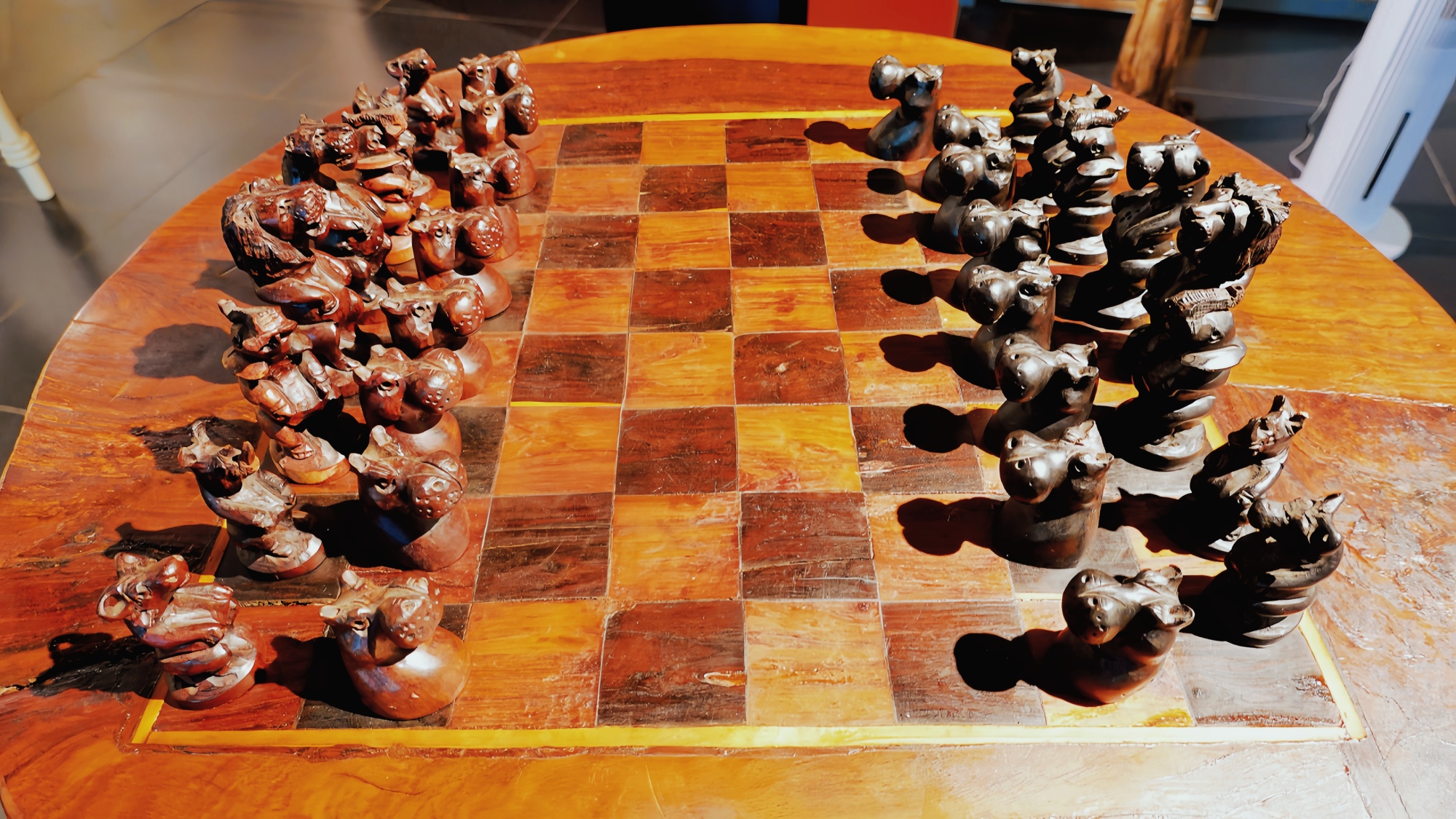 A wildlife-themed chess set table is seen at the Apex African Art Gallery on August 7, 2024. /CGTN