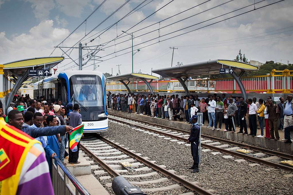 Passengers take an electric train built by an Chinese enterprise in Addis Ababa, Ethiopia, September 20, 2015. /CFP
