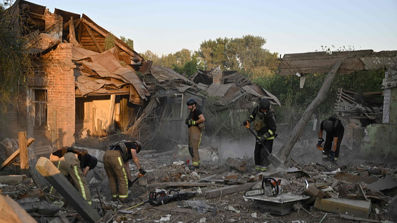 Rescuers clear debris of a house destroyed following a strike in the town of Bilopillya, near the Russian border in the Sumy region, August 18, 2024. /CFP