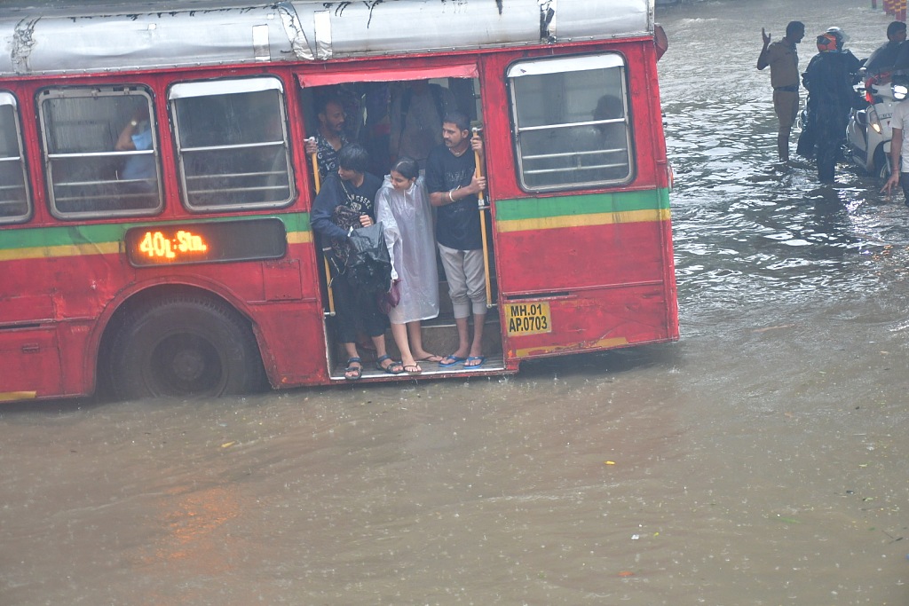 A bus on a waterlogged road during monsoon rain at Parel neighborhood in Mumbai, India, July 21, 2024. /CFP