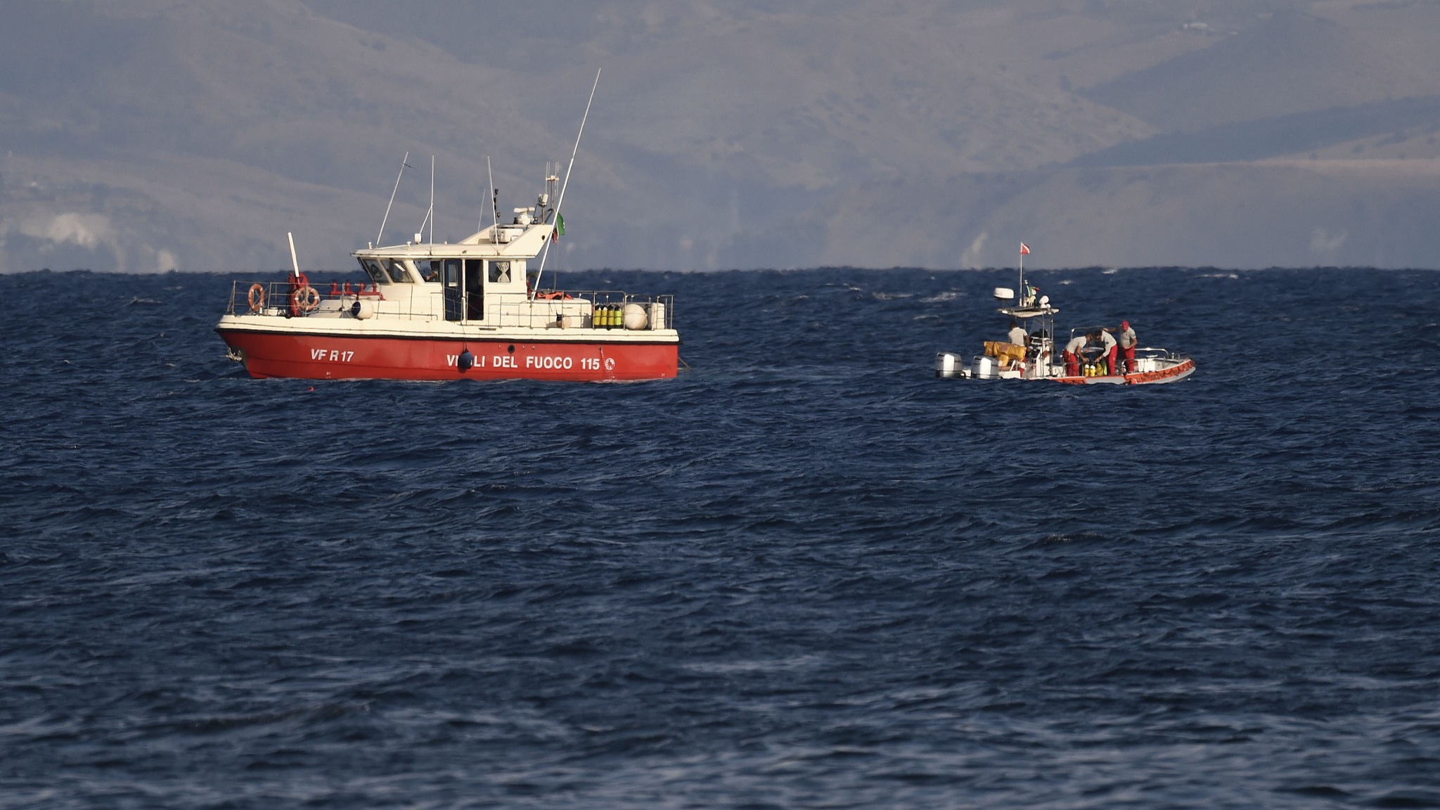 Emergency services at the scene of the search for a missing boat, in Porticello, southern Italy, August 20, 2024. /CFP