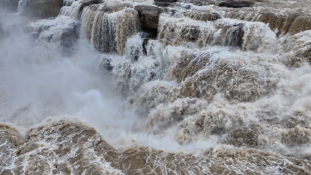 A photo taken on July 12, 2024 shows the majestic Hukou Waterfall in Linfen, Shanxi Province. /IC