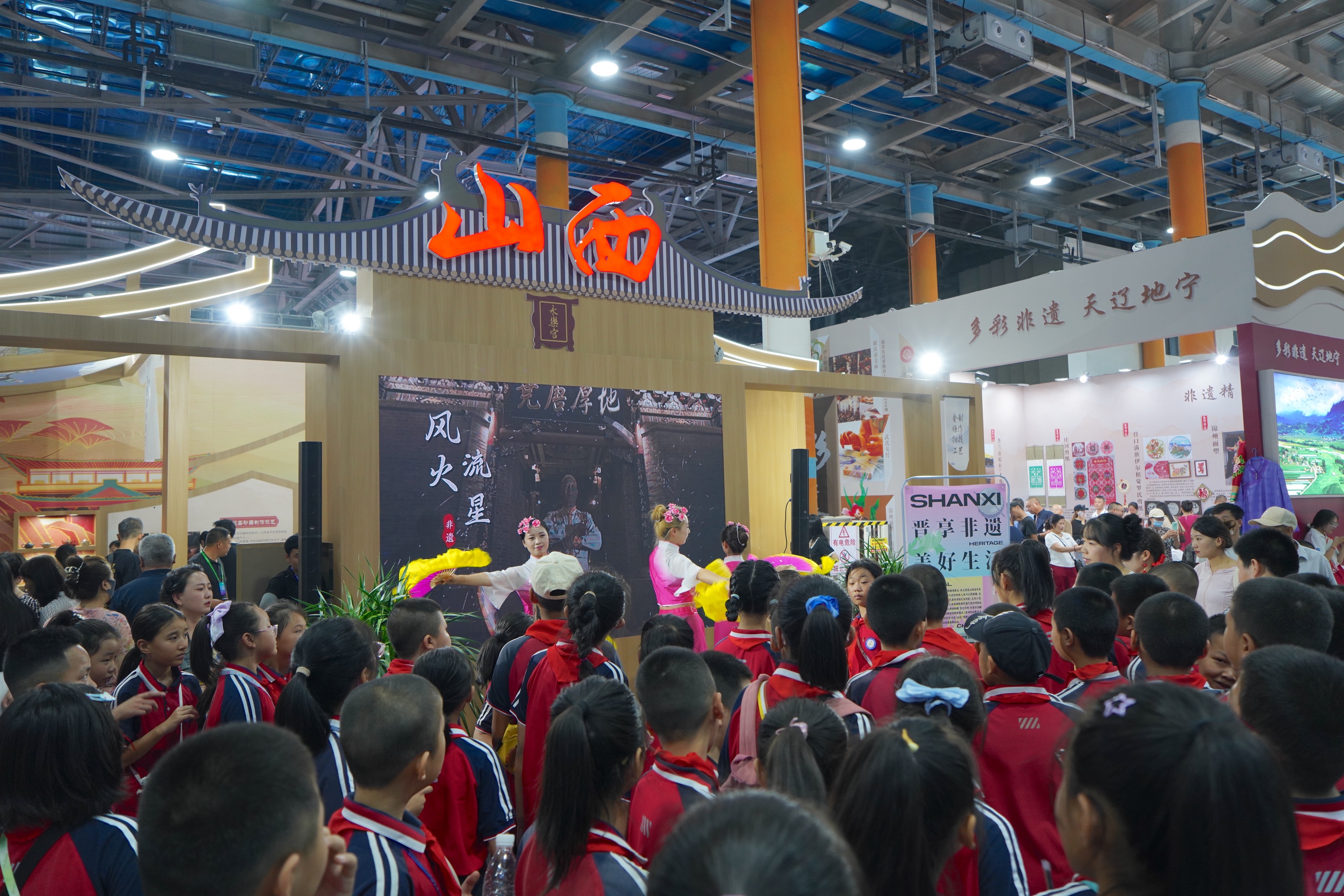 Pupils watch performances during the 