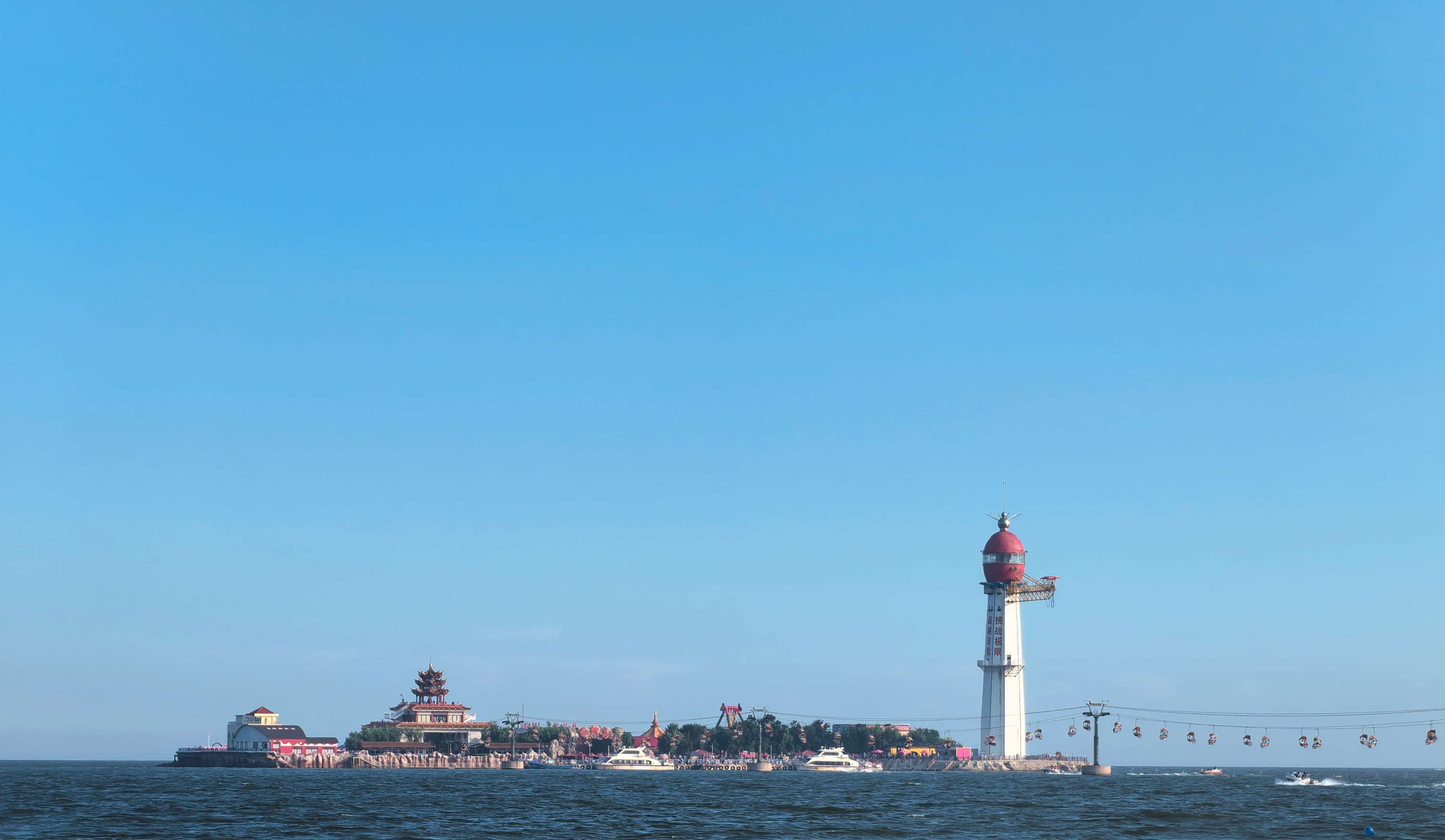 This photo taken on August 11, 2024 shows the 1,039-meter-long cross-sea cableway at Xianluo Island in Qinhuangdao, north China's Hebei Province. /CGTN