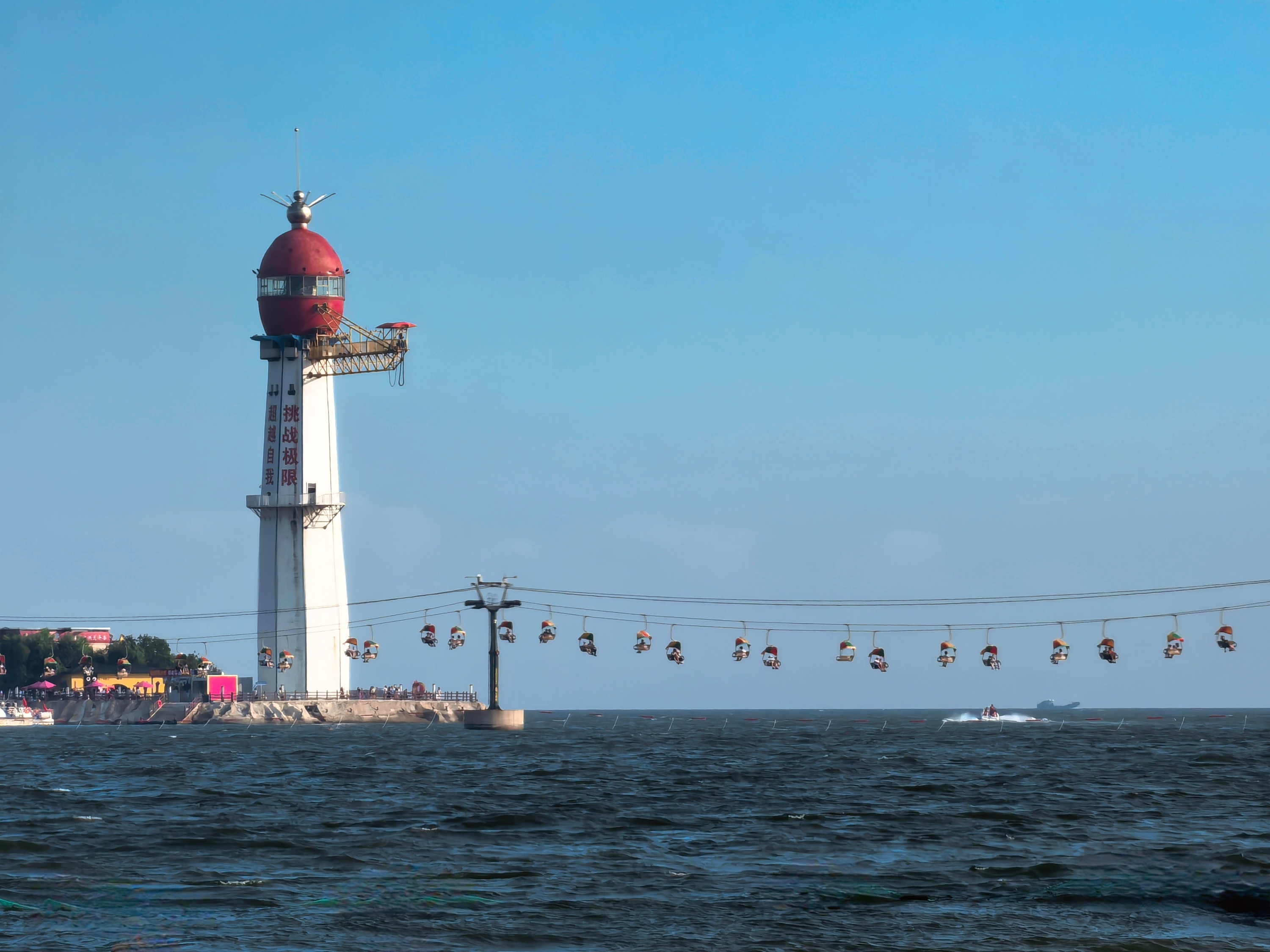 This photo taken on August 11, 2024 shows the 1,039-meter-long cross-sea cableway at Xianluo Island in Qinhuangdao, north China's Hebei Province. /CGTN