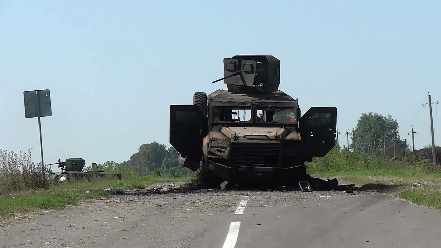 In this handout video grab released by the Russian Defense Ministry, a Ukrainian military vehicle destroyed by servicemen of the 810th naval infantry brigade of the Russian Black Sea Fleet is seen on a road in Kursk region, Russia, August 20, 2024. /CFP