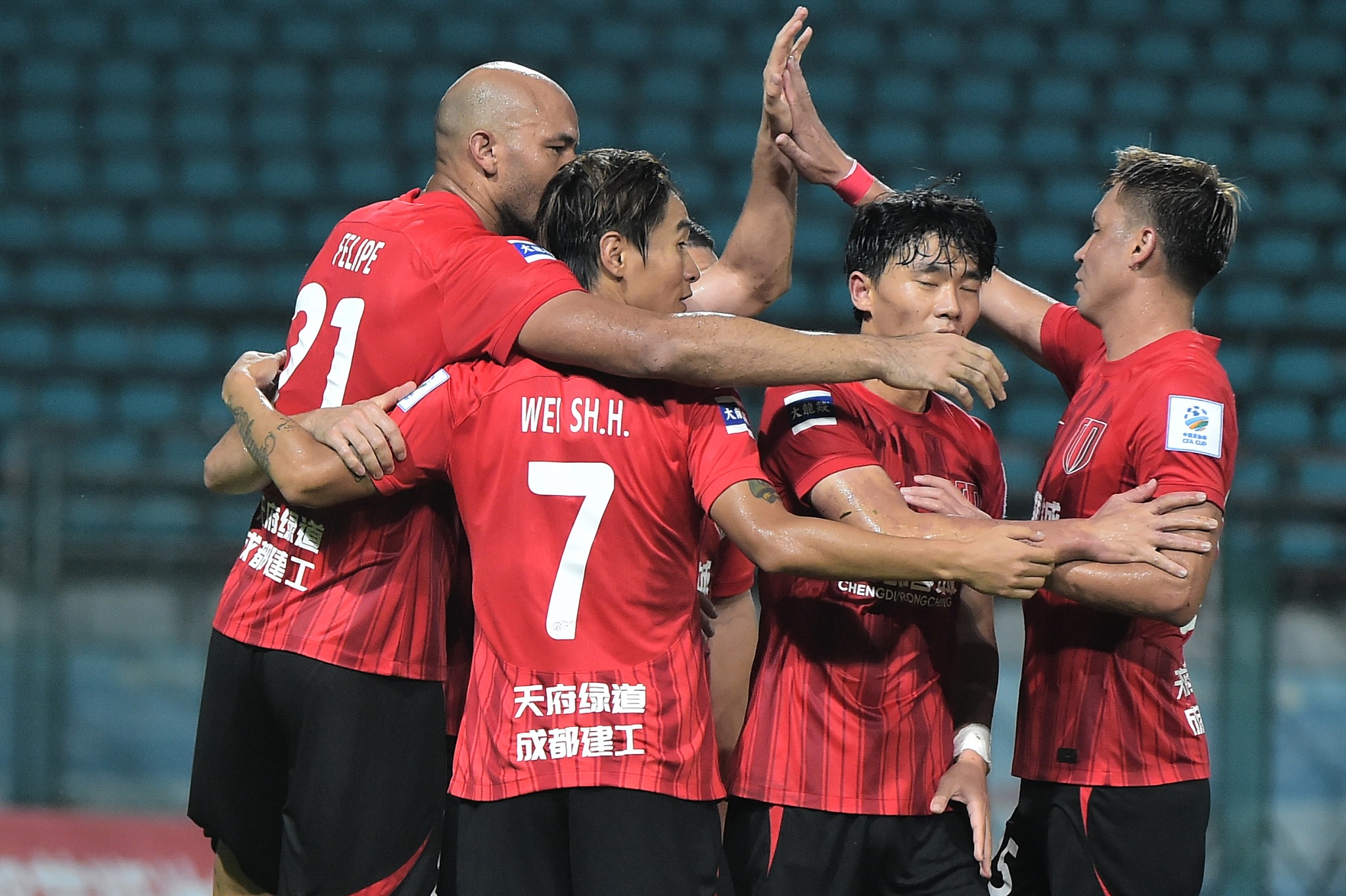 Chengdu Rongcheng players celebrate after scoring a goal in the Chinese Football Association Cup quarterfinals against Nanjing City in Nanjing, east China's Jiangsu Province, August 21, 2024. /CFP