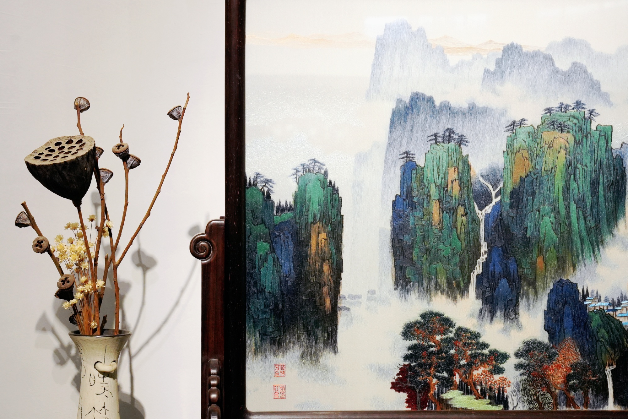 Wuxi fine embroidery art is seen on display at Huishan Ancient Town in Wuxi, Jiangsu Province July 23, 2024. /CGTN