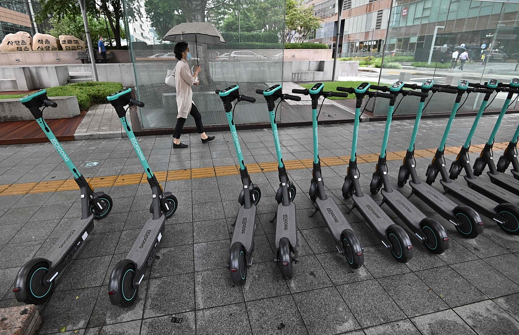 Parked electric scooters for hire on a street in central Seoul, South Korea. /CFP