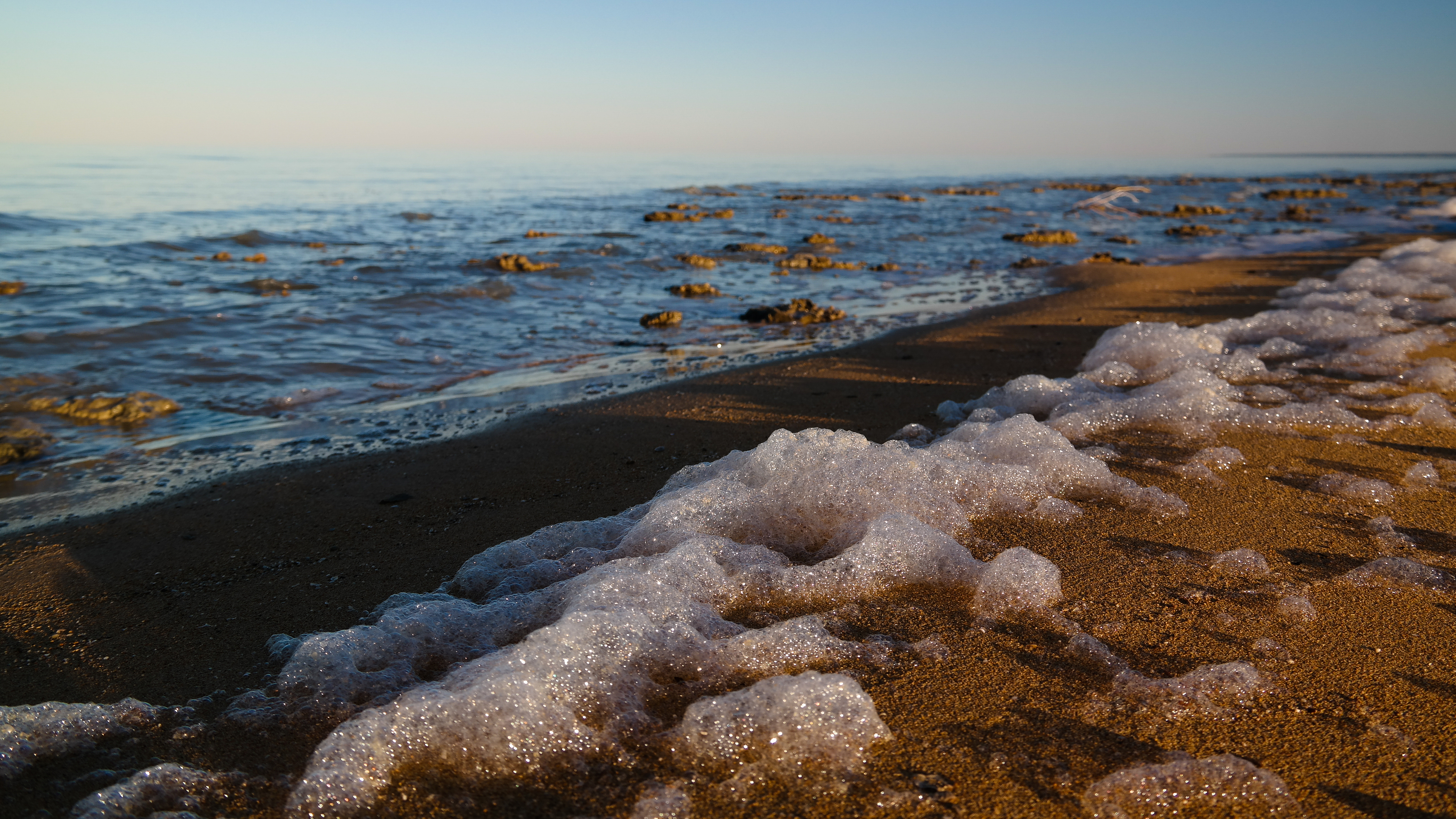 An undated photo shows sea foam on the Aral Sea beach in Karakalpakstan, Uzbekistan. /CFP