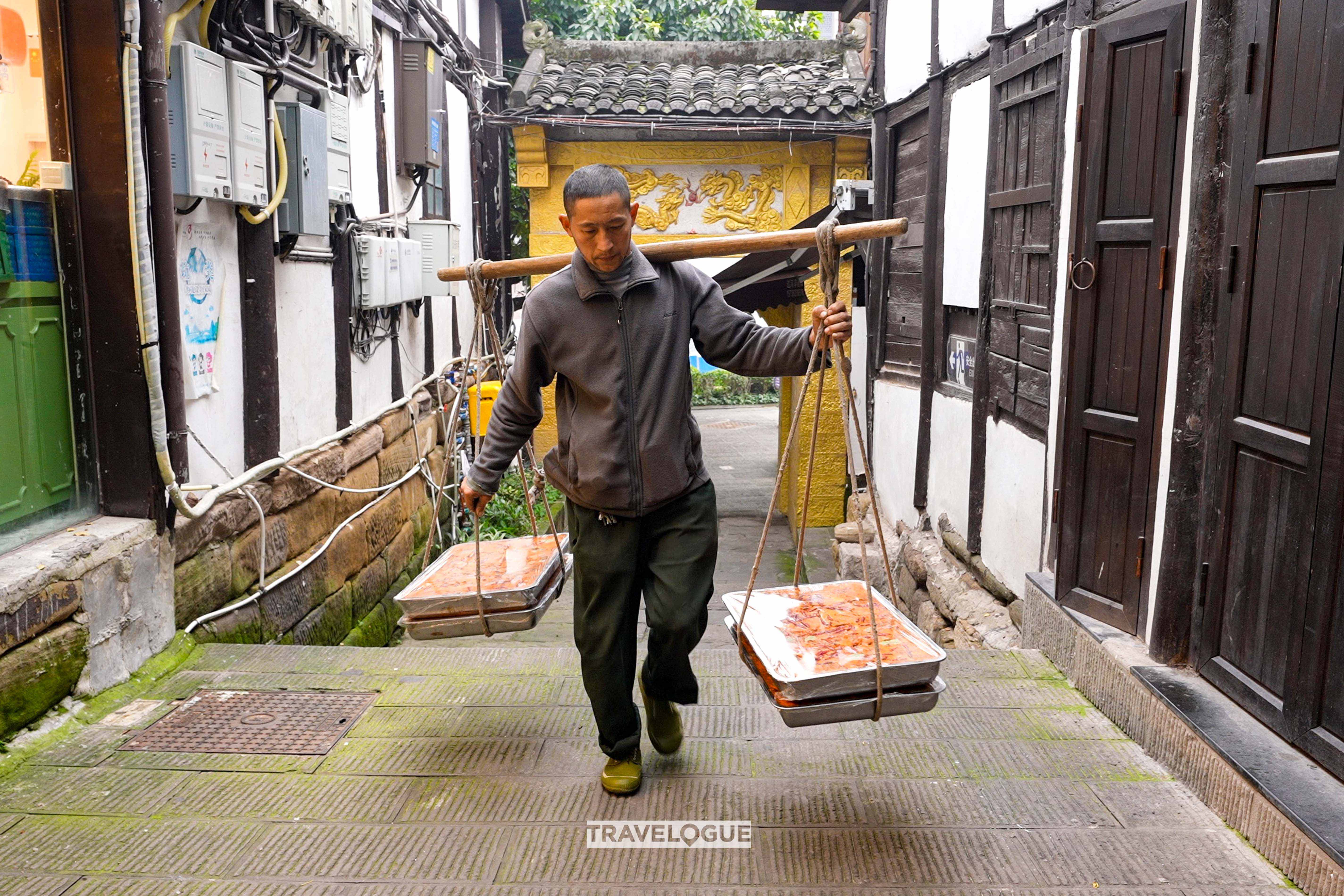 Compressed bricks of hotpot soup base are delivered to restaurants and shops in Chongqing. /CGTN