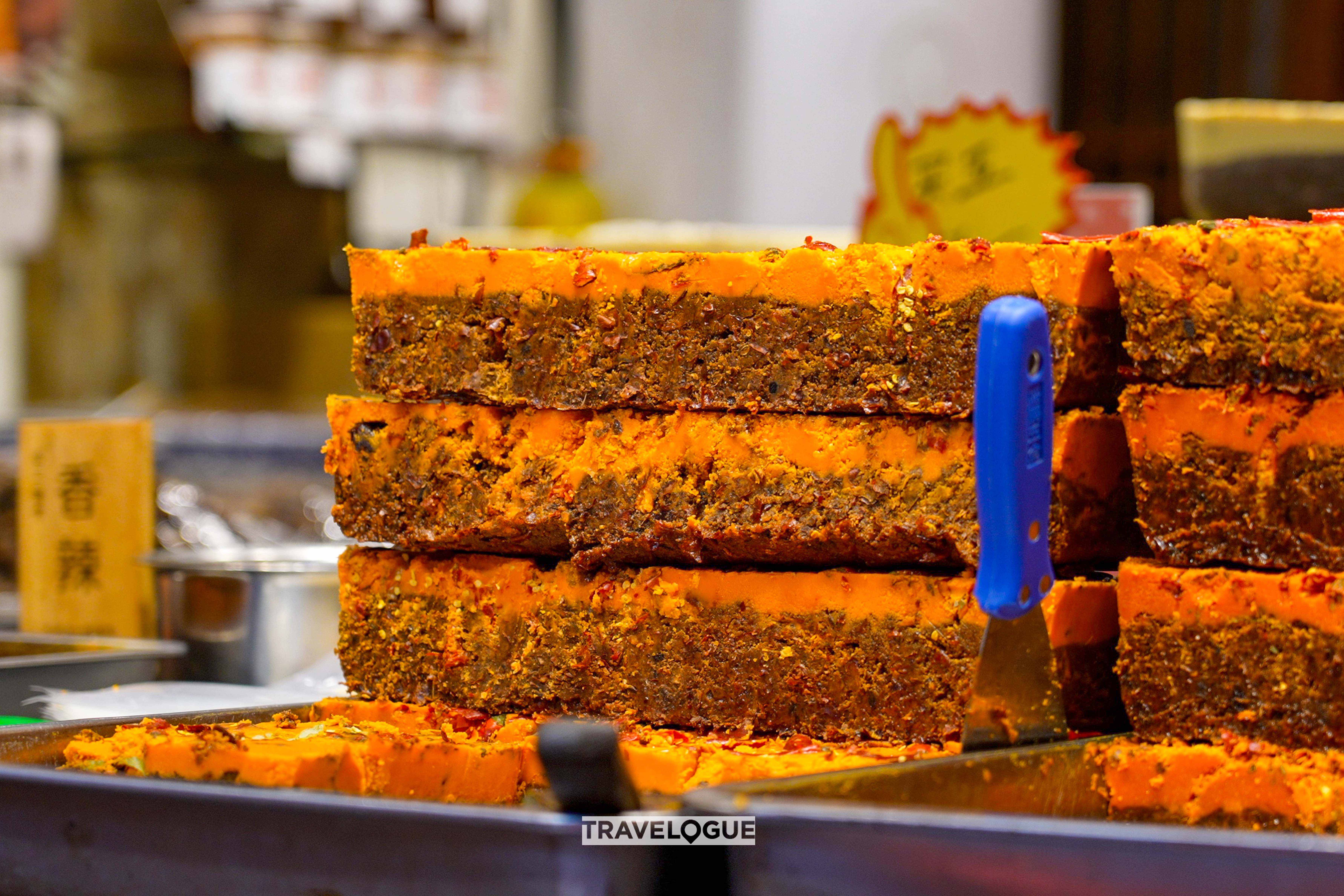 Compressed bricks of hotpot soup base are delivered to restaurants and shops in Chongqing. /CGTN