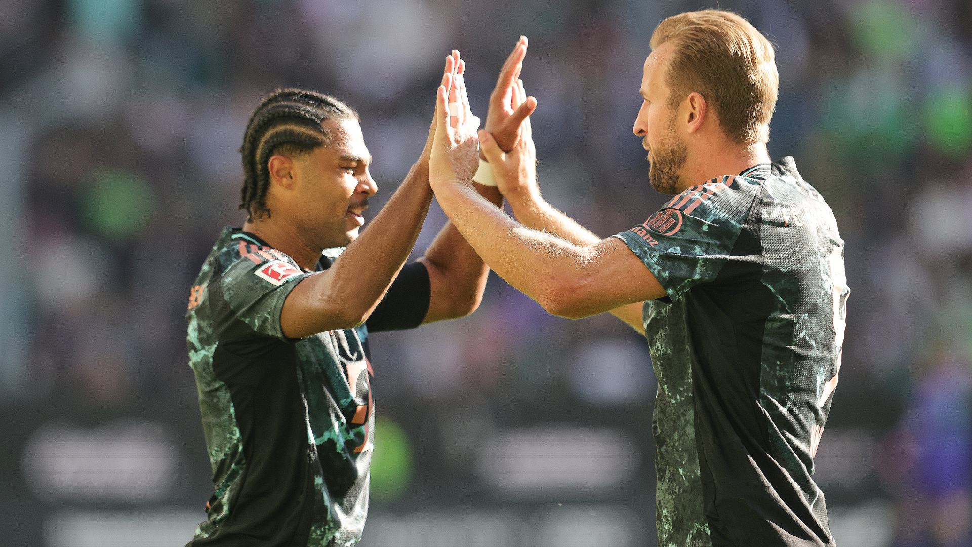 Bayern Munich edge Wolfsburg to give Kompany winning Bundesliga start