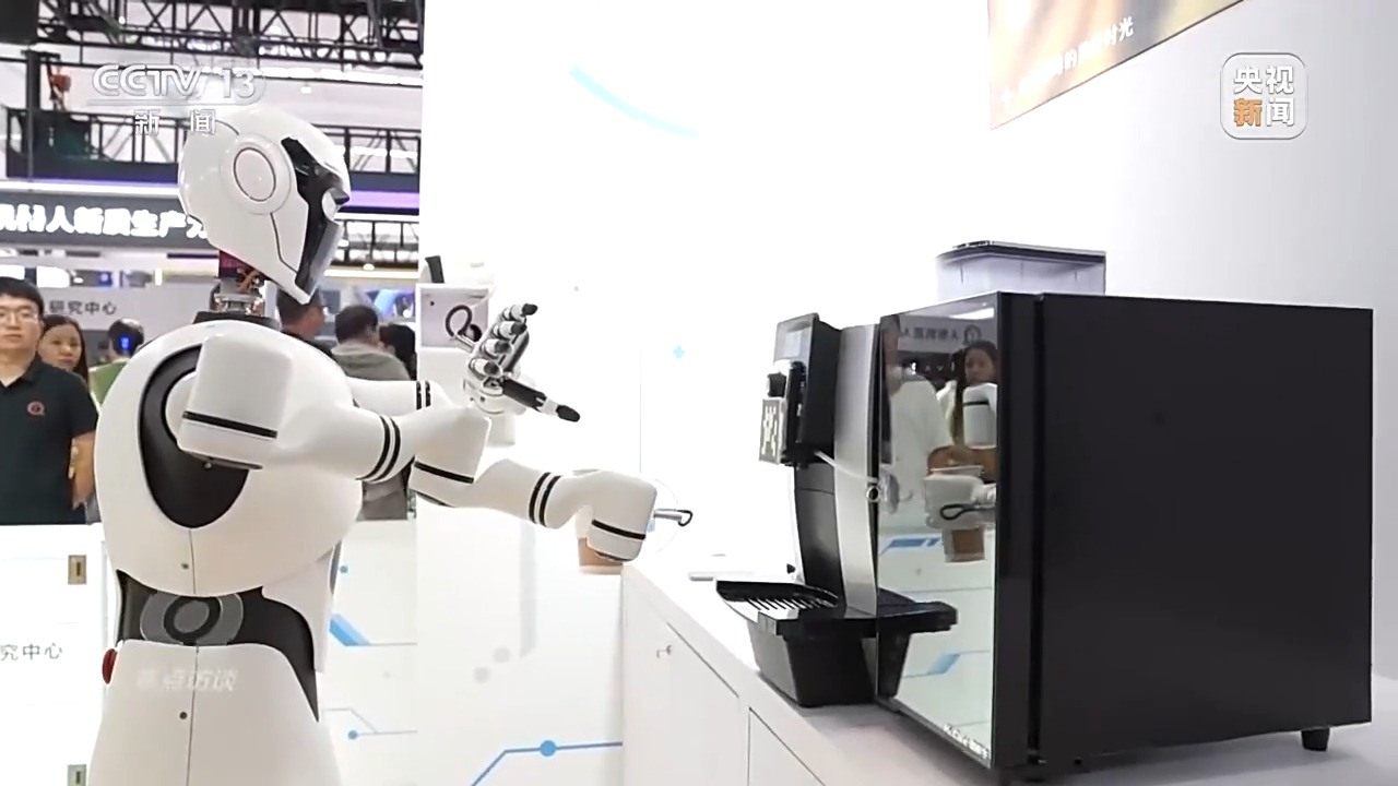 A humanoid robot making coffee at the 2024 World Robot Conference in Beijing, China. /CFP