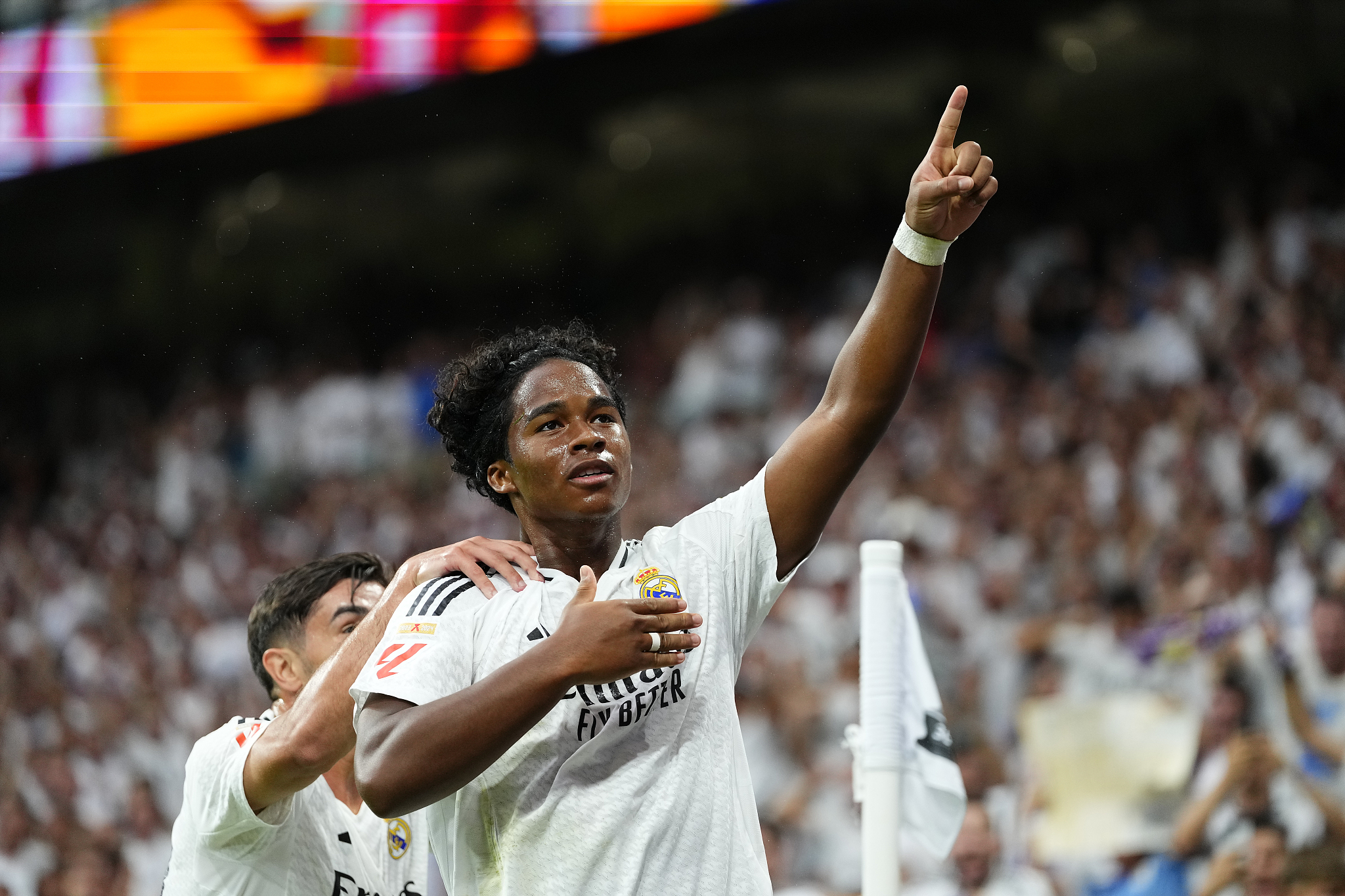 Real Madrid's Brazilian striker Endrick celebrates after scoring a goal against Real Valladolid in a Spanish La Liga match at the Estadio Santiago Bernabeu in Madrid, Spain, August 25, 2024. /CFP