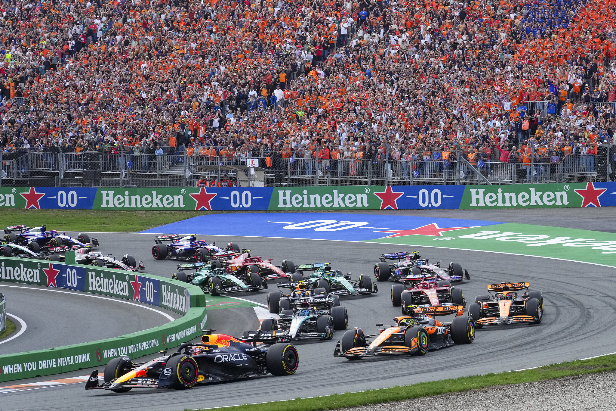 Red Bull Racing's home favorite Max Verstappen leads the field after the start of the F1 Dutch Grand Prix at the Zandvoort Circuit, in Zandvoort, the Netherlands, August 25, 2024. /CFP