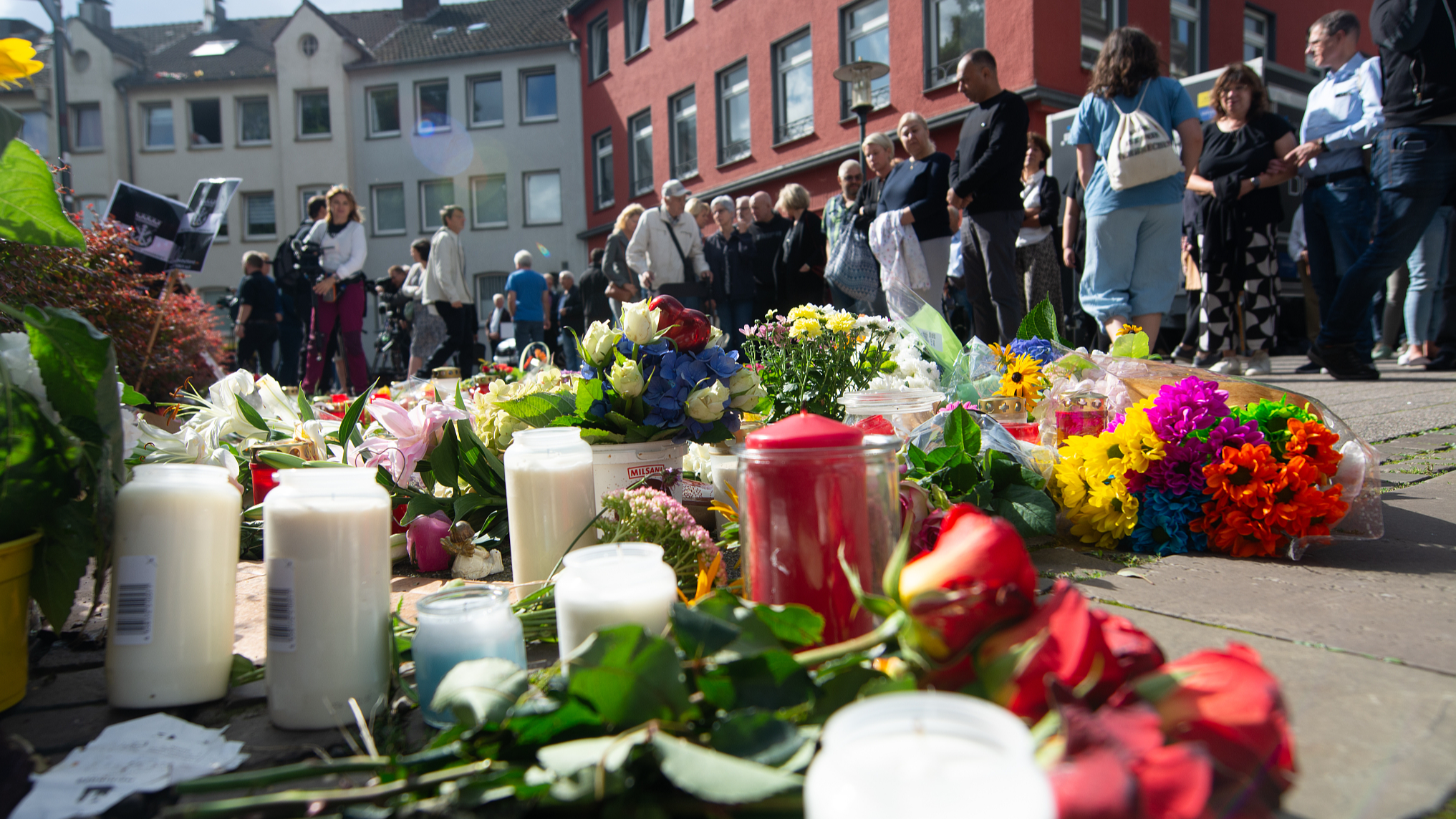 A memorial is set in front of Solingen City Church for locals who can bring flowers and candles and write messages after an attack that killed three people in Solingen, Germany, August 26, 2024. /CFP