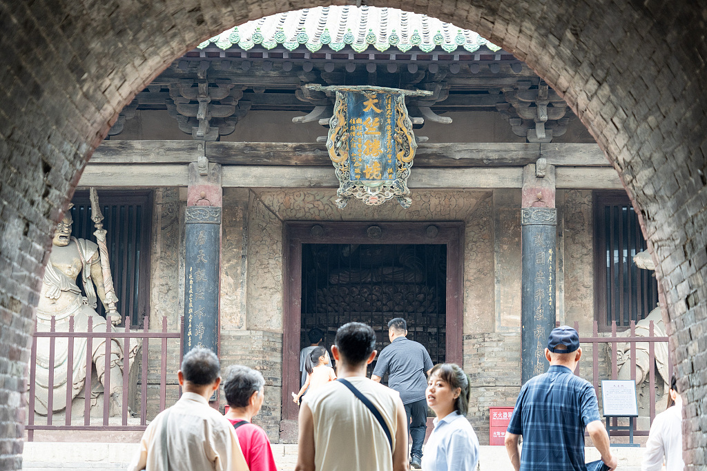 A photo taken on August 25, 2024 shows visitors at the Shuanglin Temple in Jinzhong, Shanxi Province, China. /CFP