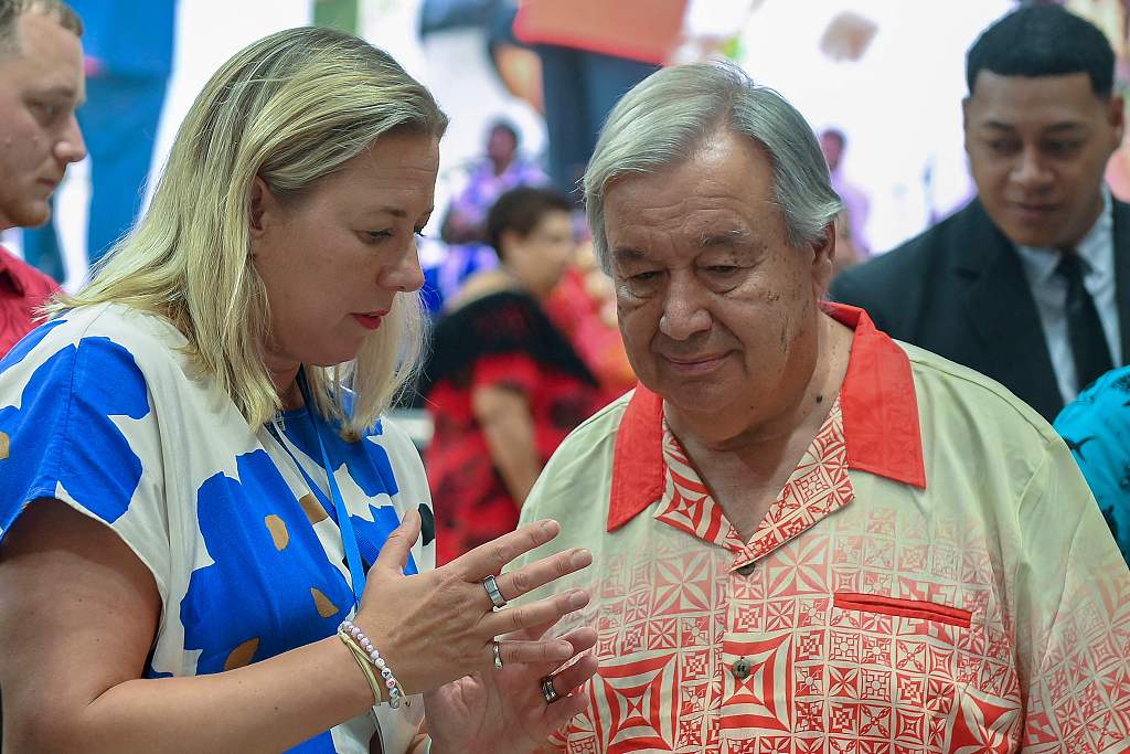 This handout photo taken and released on August 26, 2024 by the European Commission shows Jutta Urpilainen (L), European commissioner for international partnerships, speaking with UN Secretary-General Antonio Guterres during the Pacific Islands Forum meeting in Nuku'alofa. /AFP