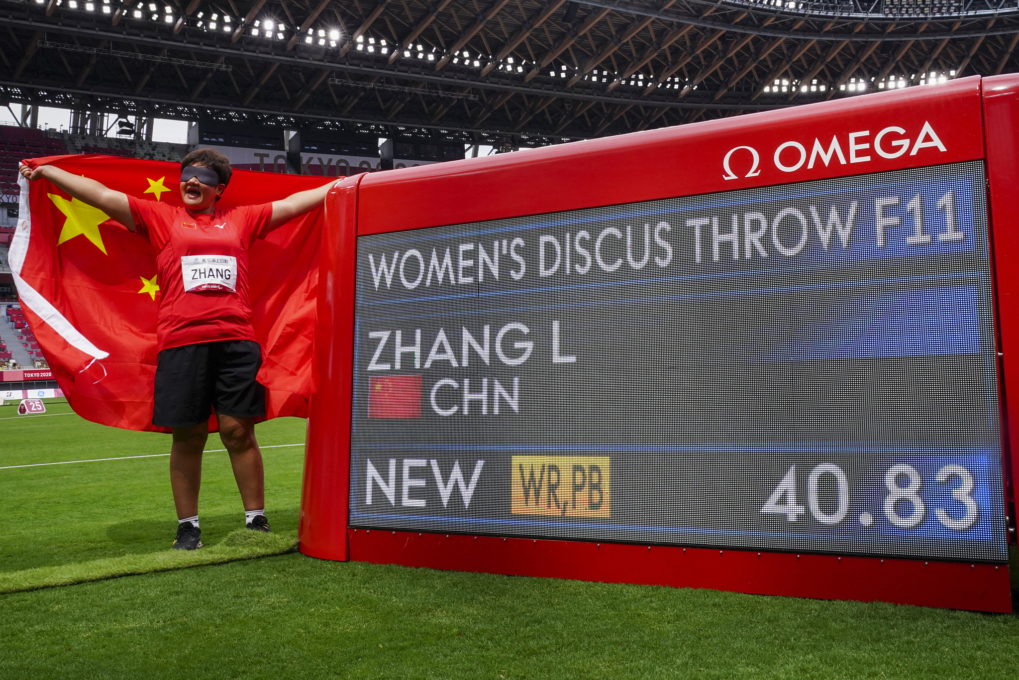 Zhang Liangmin of China sets a new world record at the Tokyo Paralympics para-athletics women's discus throw event in Tokyo, Japan, August 31, 2021. /CFP