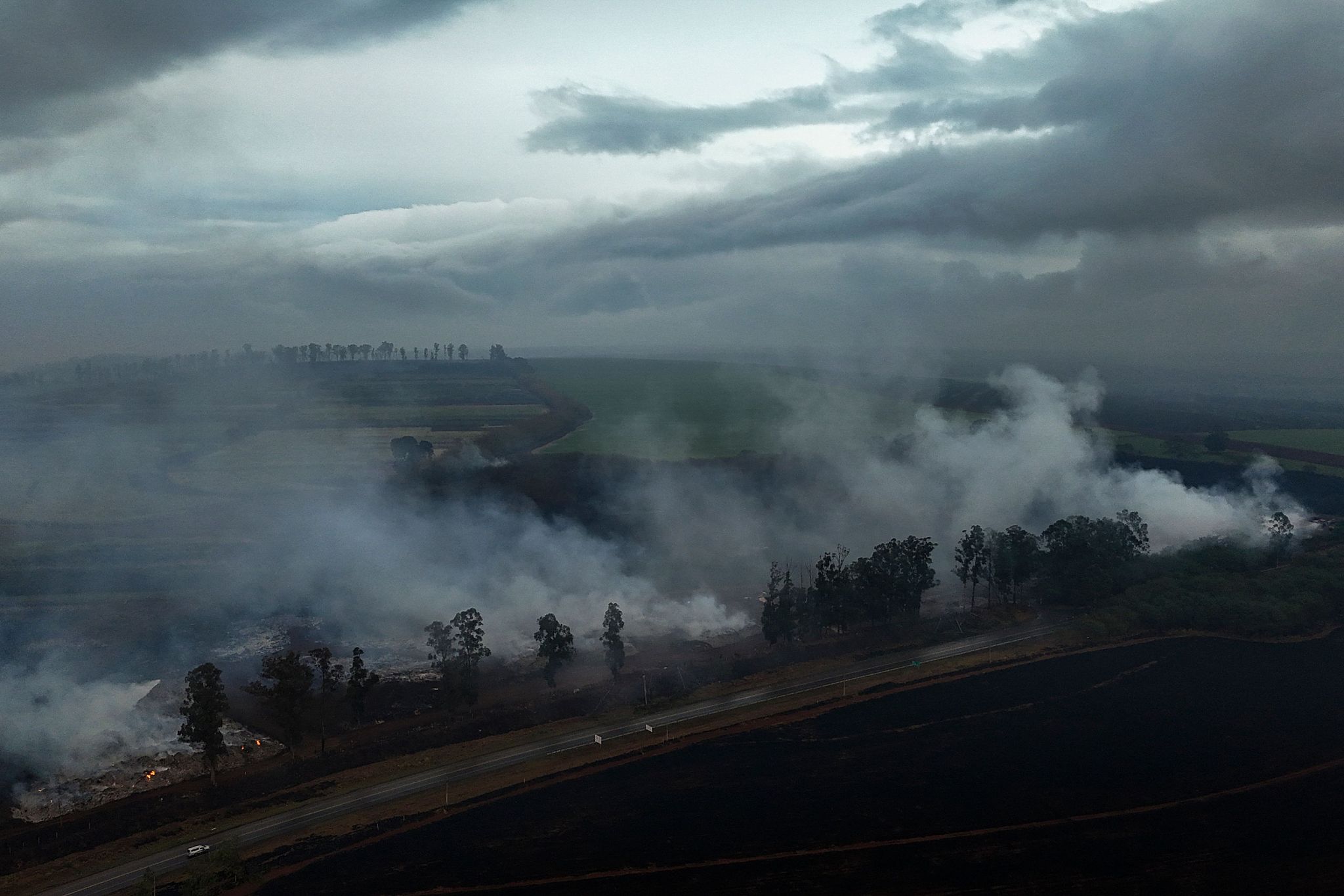 An aerial view shows a fire in the surroundings of the SP-253 highway in Ribeirao Preto, Sao Paulo state, Brazil, August 25, 2024. /CFP