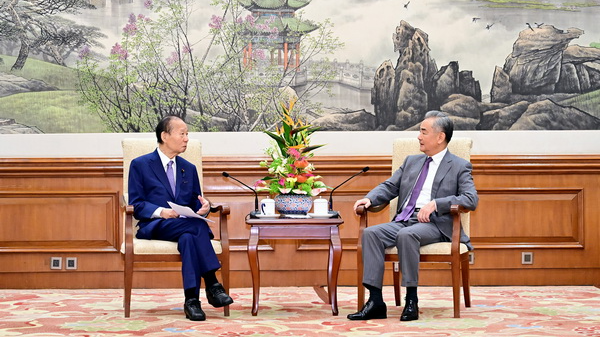 Wang Yi (R),  a member of the Political Bureau of the CPC Central Committee and director of the Office of the Foreign Affairs Commission of the CPC Central Committee, meets with Toshihiro Nikai, chairman of the Japan-China Friendship Parliamentarians' Union, in Beijing, China, August 28, 2024. /Chinese Foreign Ministry