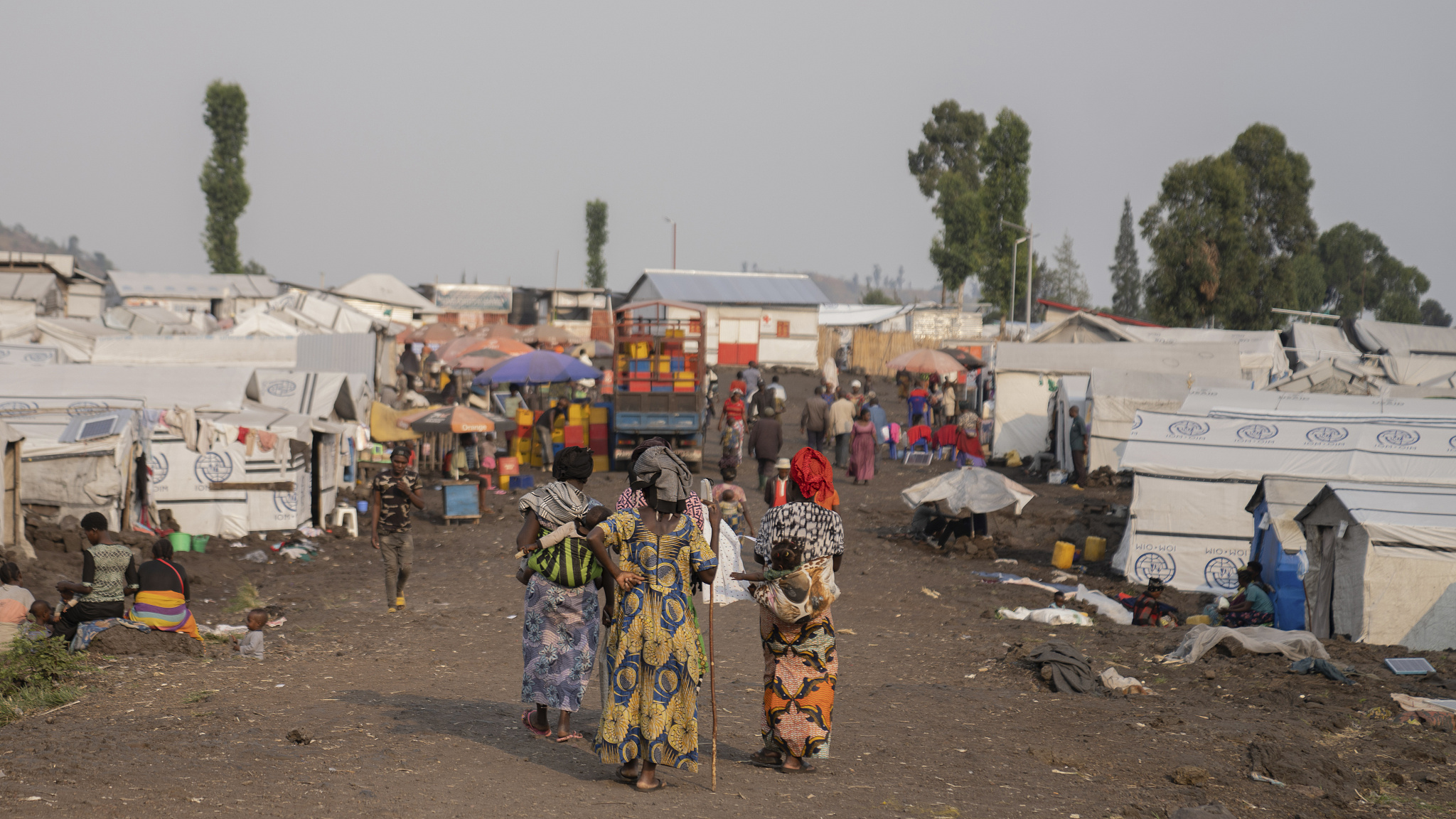 Women walk in the Bulengo Camp in Goma, Democratic Republic of Congo, August 15, 2024. /CFP