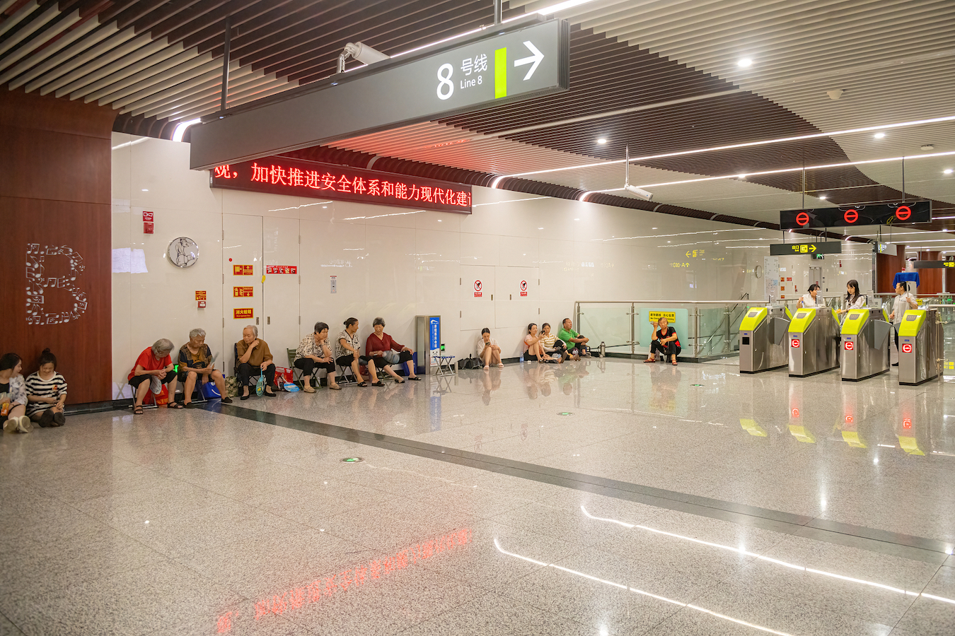 Citizens enjoy cool air at a subway station amid heat wave in Chengdu City, southwest China's Sichuan Province, August 25, 2024. /CFP