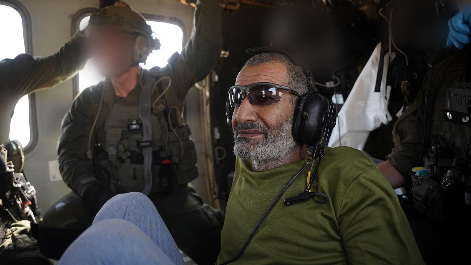 Israeli captive Qaed Farhan Alkadi, 52, is seen in a helicopter in Israel on August 27, 2024. Being held by Hamas militants since October 7, 2023, Alkadi is the eighth hostage freed through a military operation and the first Israeli-Arab hostage to be rescued alive. He is also the first hostage rescued from the underground. /CFP
