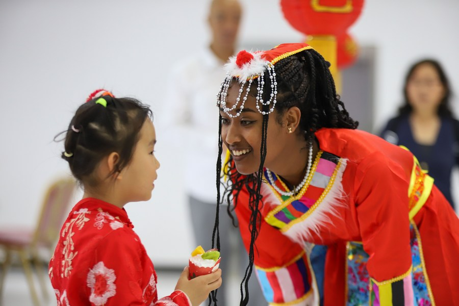 People interact at a United Nations Chinese Language Day event in Addis Ababa, Ethiopia, April 19, 2024. /Xinhua