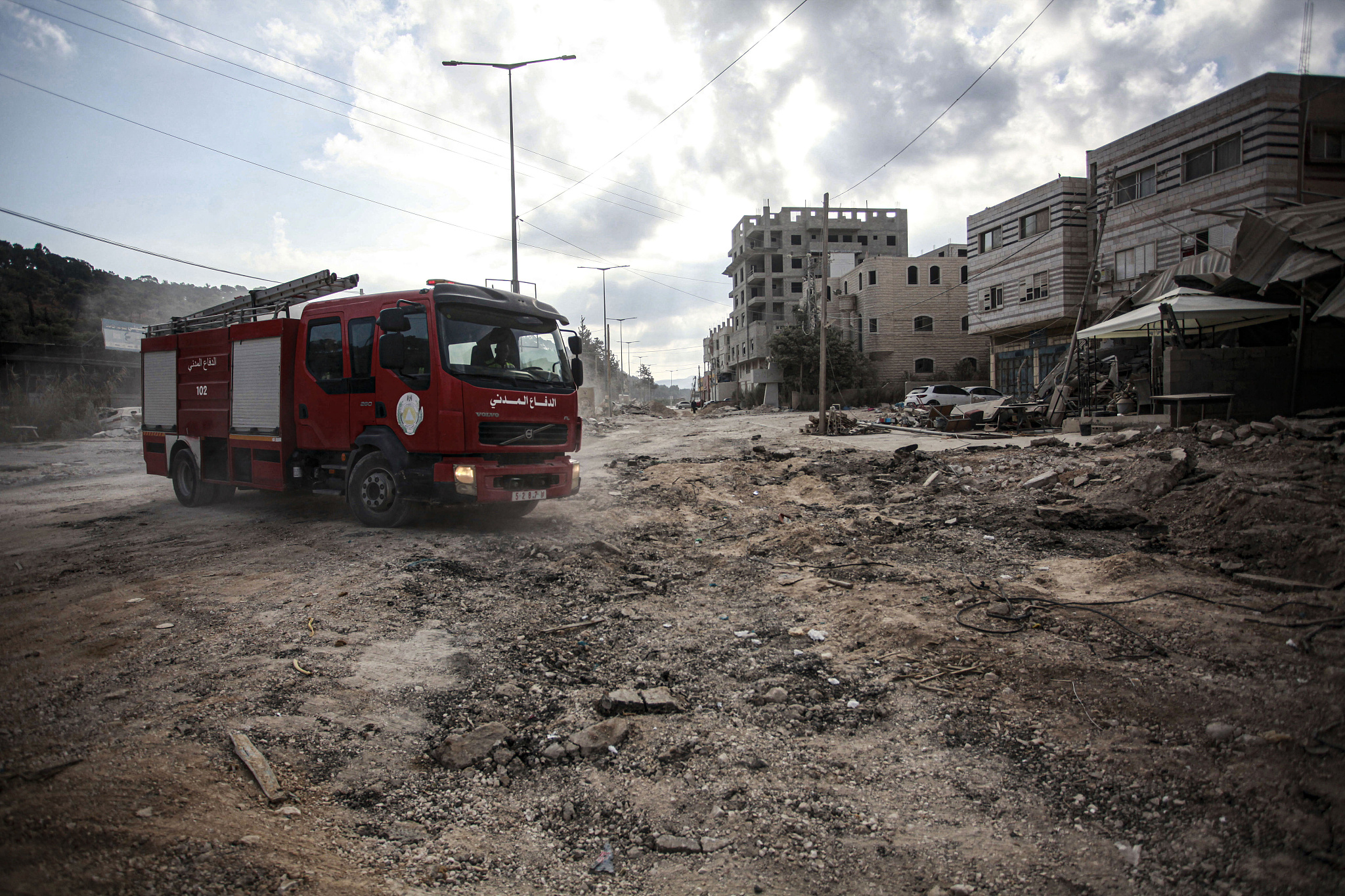 A fire truck is seen amid the destruction in the Nur Shams refugee camp near Tulkarm in the occupied West Bank following a large-scale Israeli military operation, August 30, 2024. /CFP