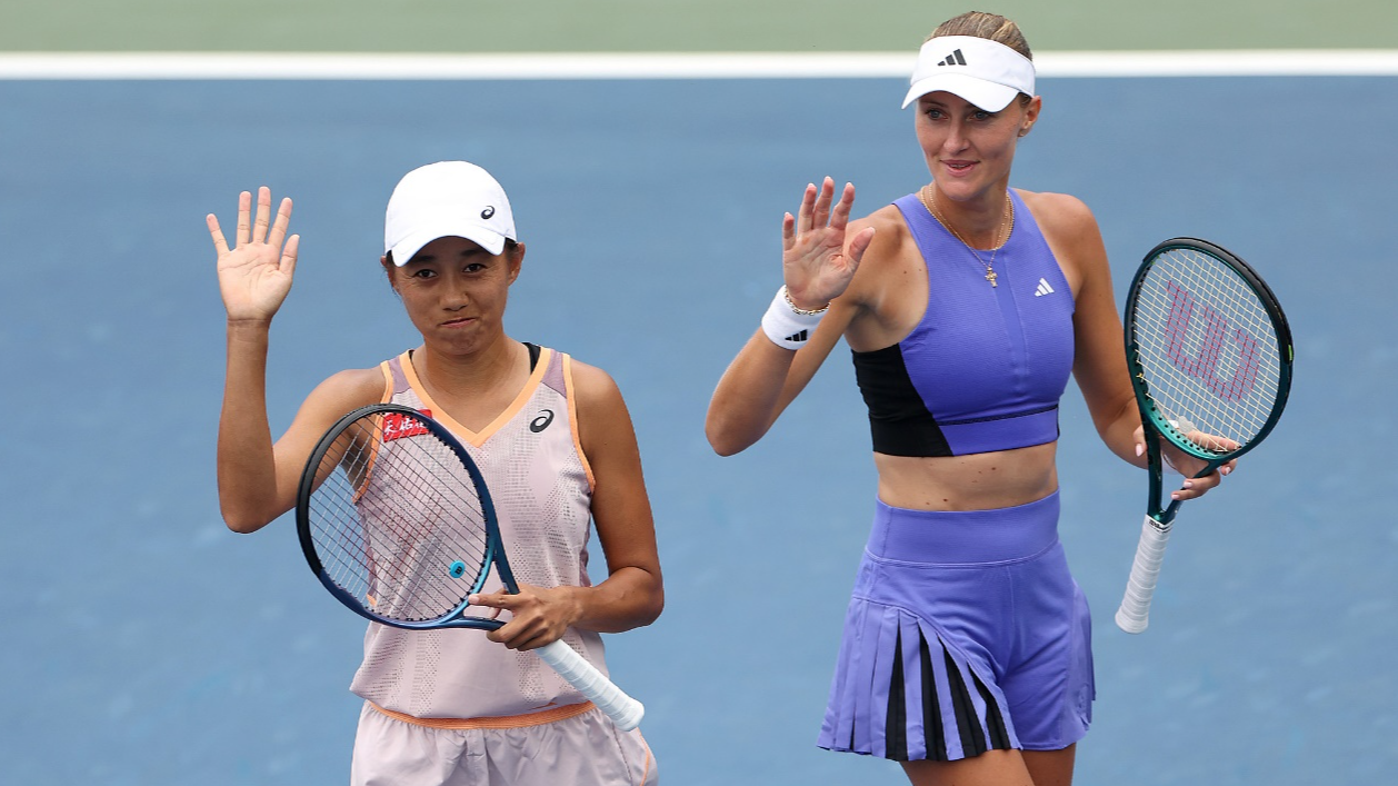 China's Zhang Shuai (L) and Kristina Mladenovic of France react after winning their women's doubles second round match of the US Open at USTA Billie Jean King National Tennis Center in New York City, US, August 31, 2024. /CFP