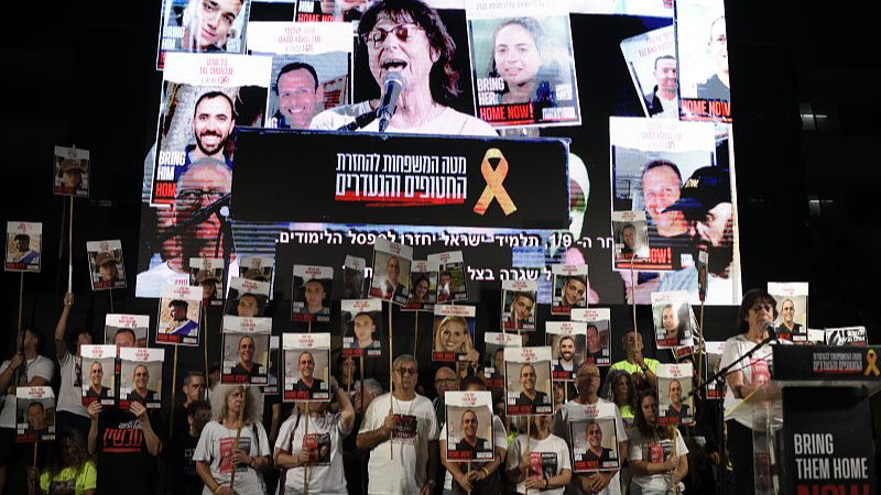 Thousands of Israelis, including the families of hostages, attend the rally in support of the hostages that are still being held by Hamas in Gaza, outside 