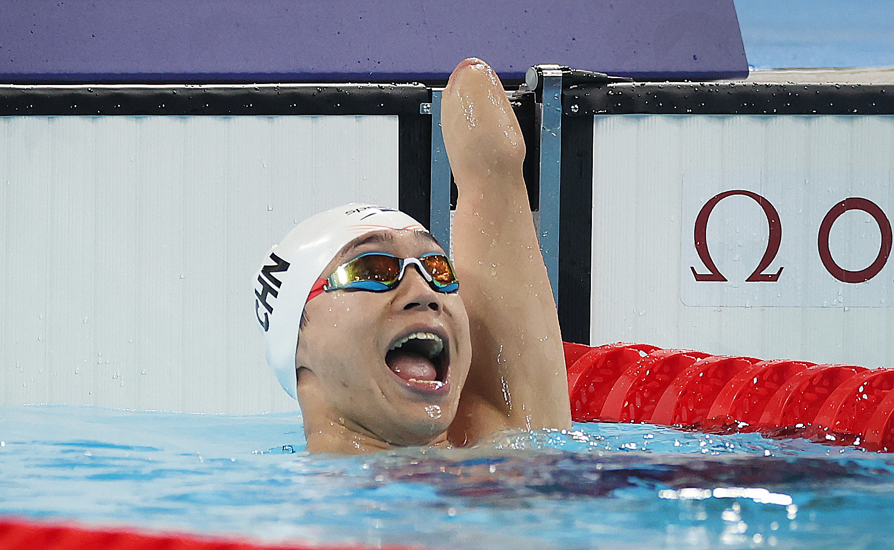 Yang Hong of China reacts after winning the men's 100-meter breaststroke SB6 swimming final at the 2024 Summer Paralympic Games in Paris, France, September 1, 2024. /CFP