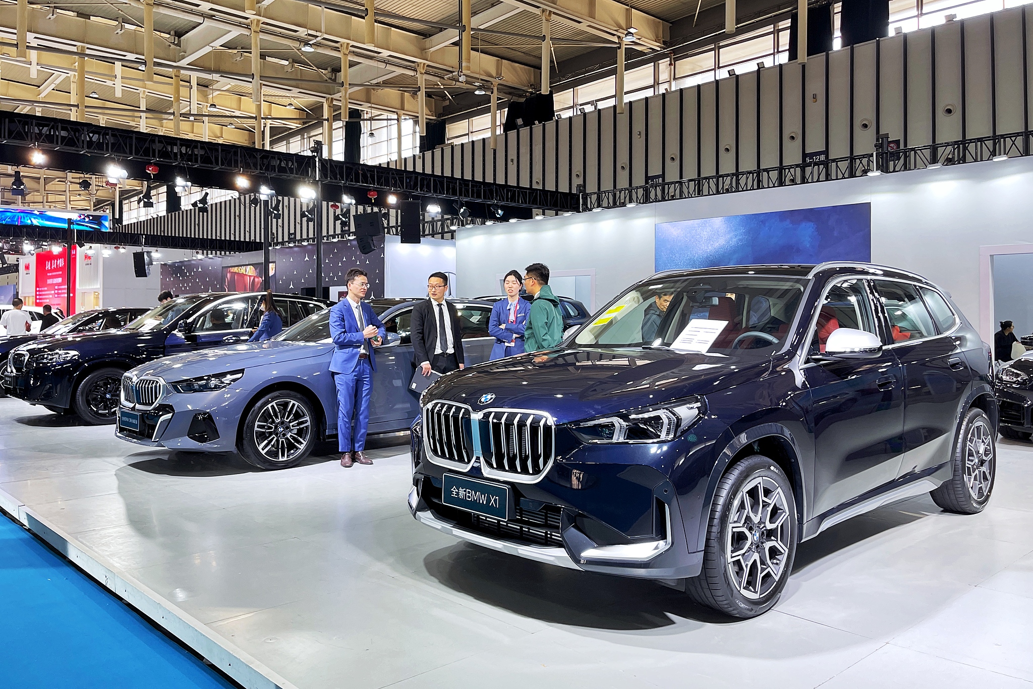 BMW's new electric vehicle booth at the Nanjing International New Energy Vehicle Exhibition at Nanjing International Expo Center, Jiangsu Province, China, March 22, 2024. /CFP