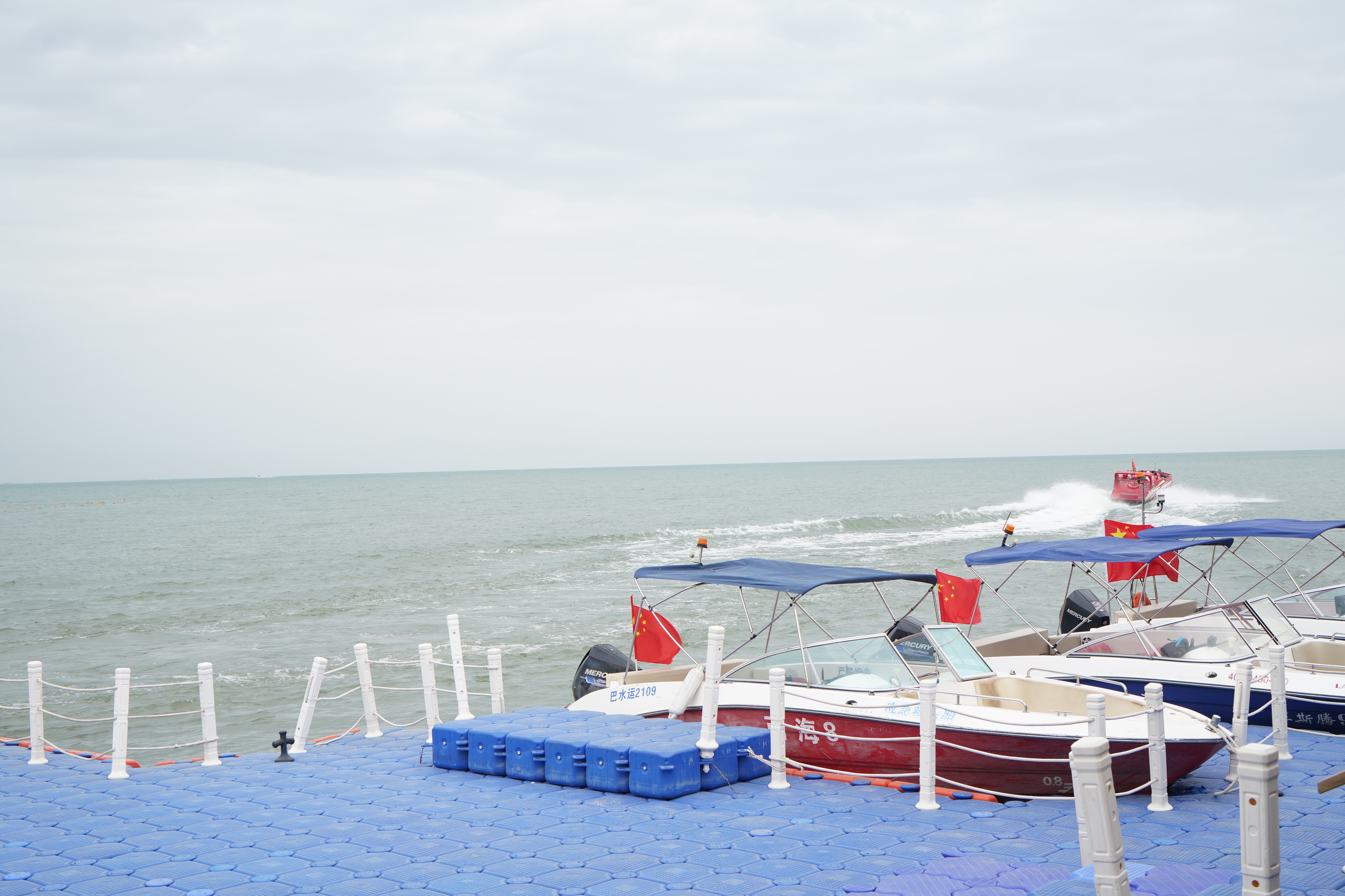 Pleasure boats are pictured on Bosten Lake this autumn in Xinjiang. /CGTN