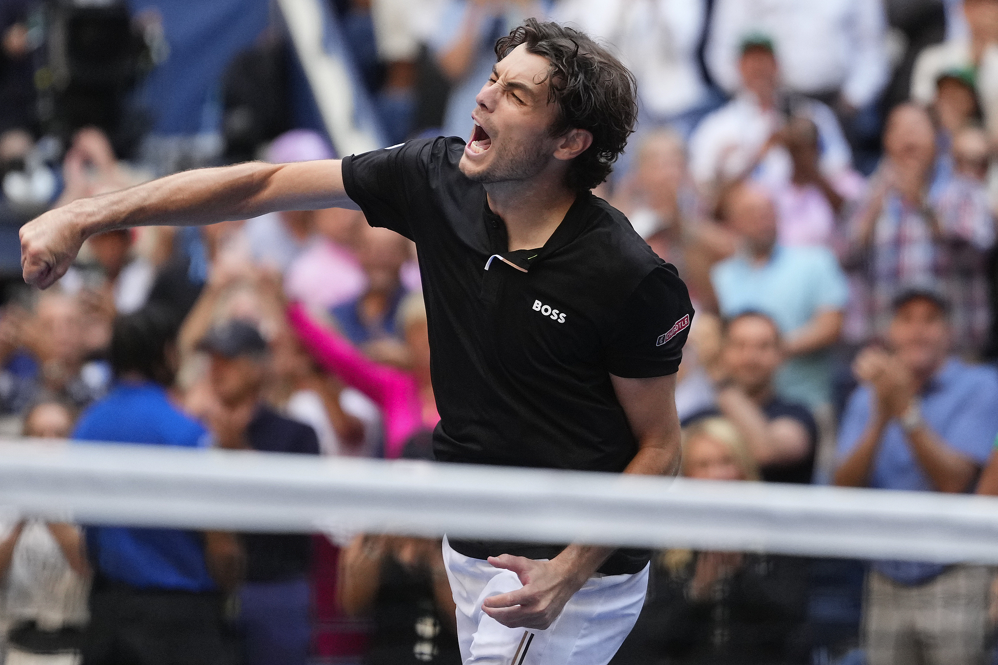 Taylor Fritz of the U.S. celebrates after defeating Alexander Zverev of Germany in the men's singles quarterfinals at the U.S. Open at the USTA Billie Jean King National Tennis Center in Queens, New York, September 3, 2024. /CFP