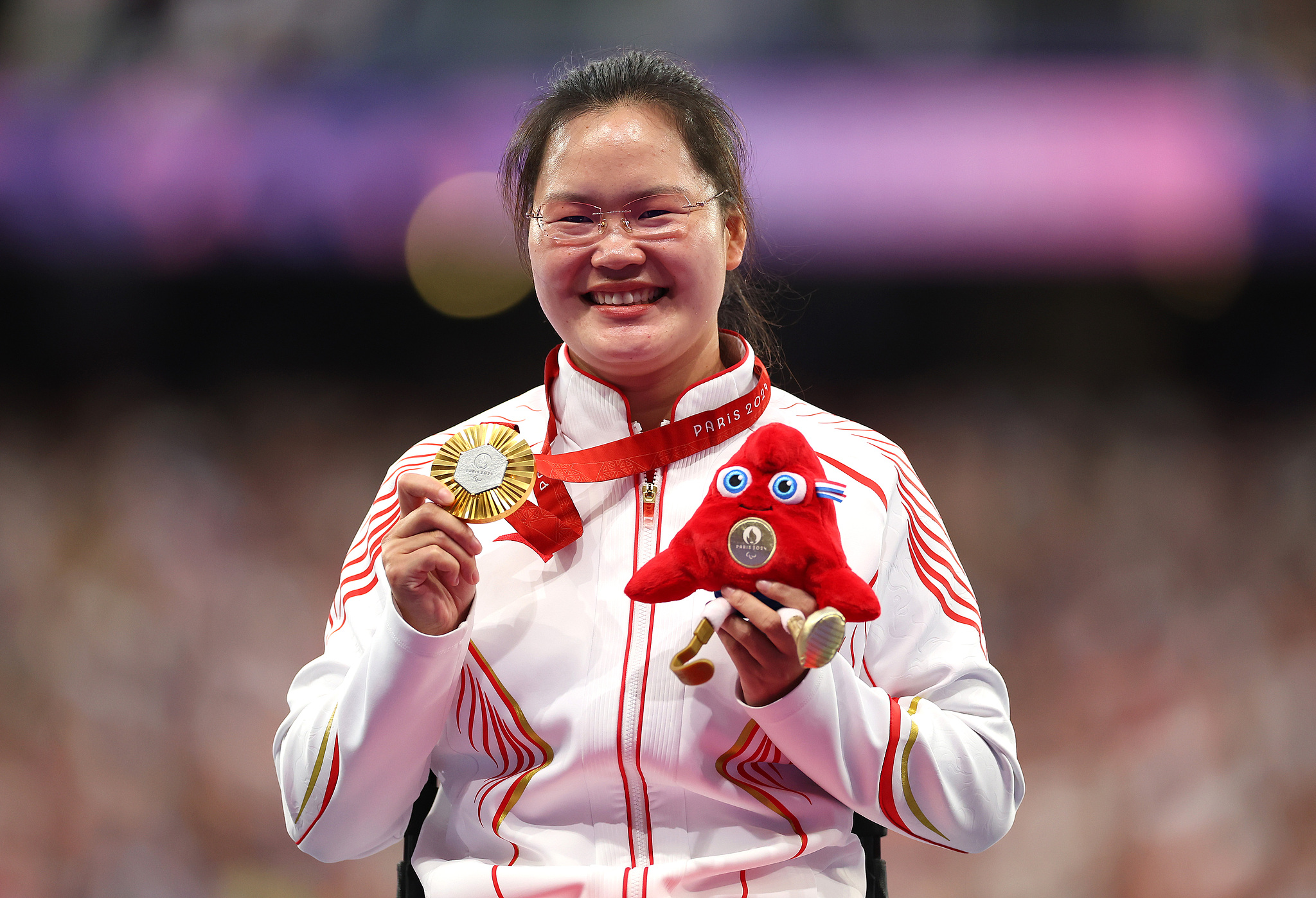 Zou Lijuan of China wins the women's shot put F34 gold medal at the 2024 Summer Paralympic Games in Paris, France, September 3, 2024. /CFP