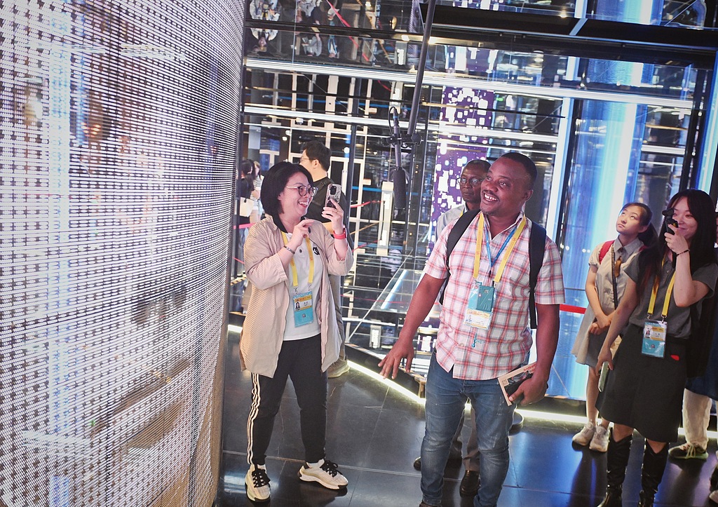 Journalists visit the Metaverse installation at the Beijing City Library on September 4, 2024. /CFP