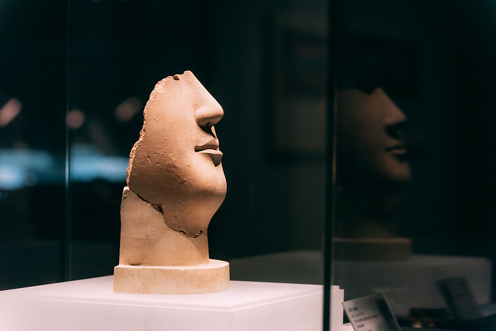 A file photo shows the half-face statue housed in Luoyang Museum, central China's Henan Province. /CFP