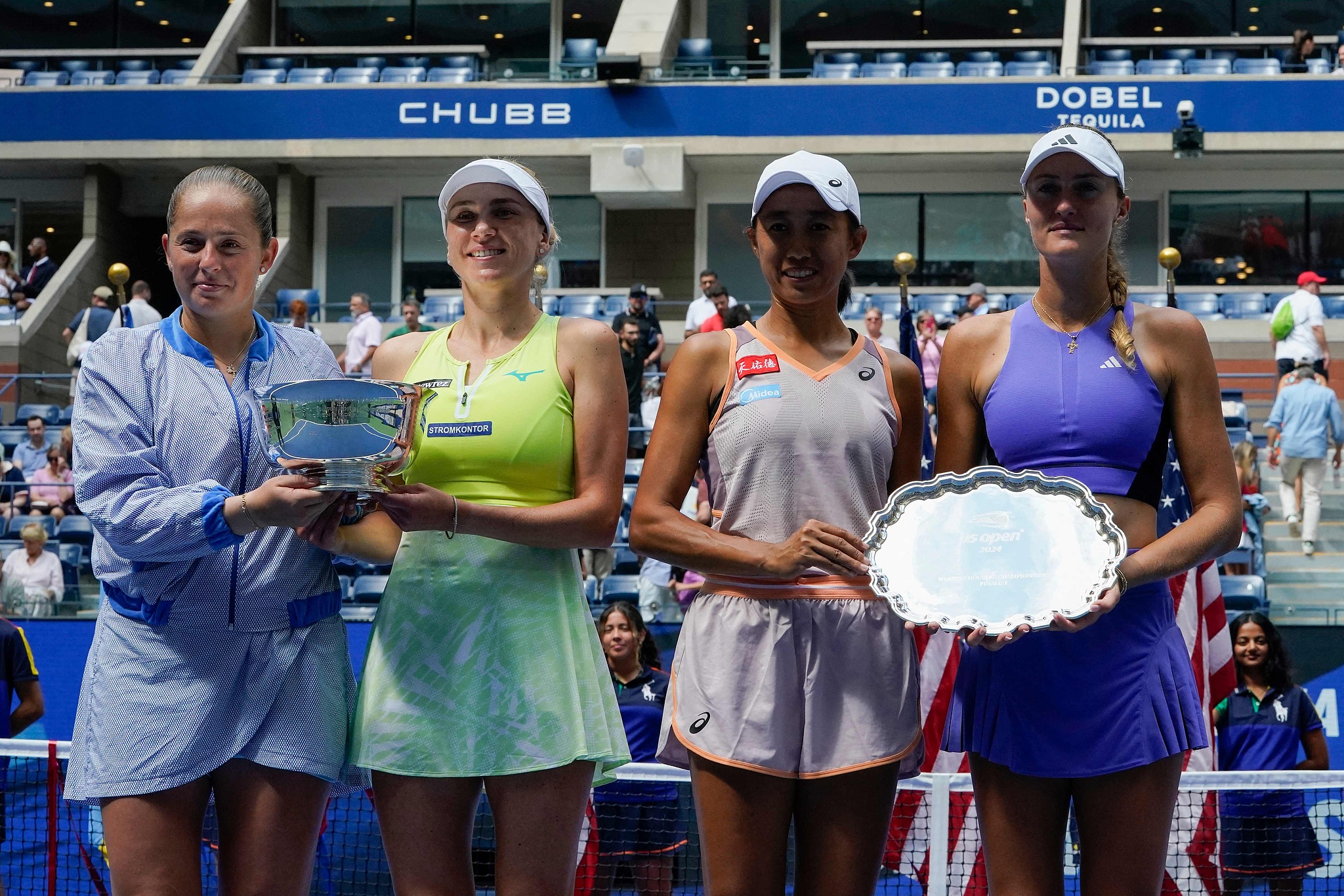 L-R: Latvia's Jelena Ostapenko, Ukraine's Lyudmyla Kichenok, China's Zhang Shuai, and France's Kristina Mladenovic pose with their first and second place trophies following their women's doubles final during the U.S. Open tennis tournament in New York, U.S., September 6, 2024. /CFP