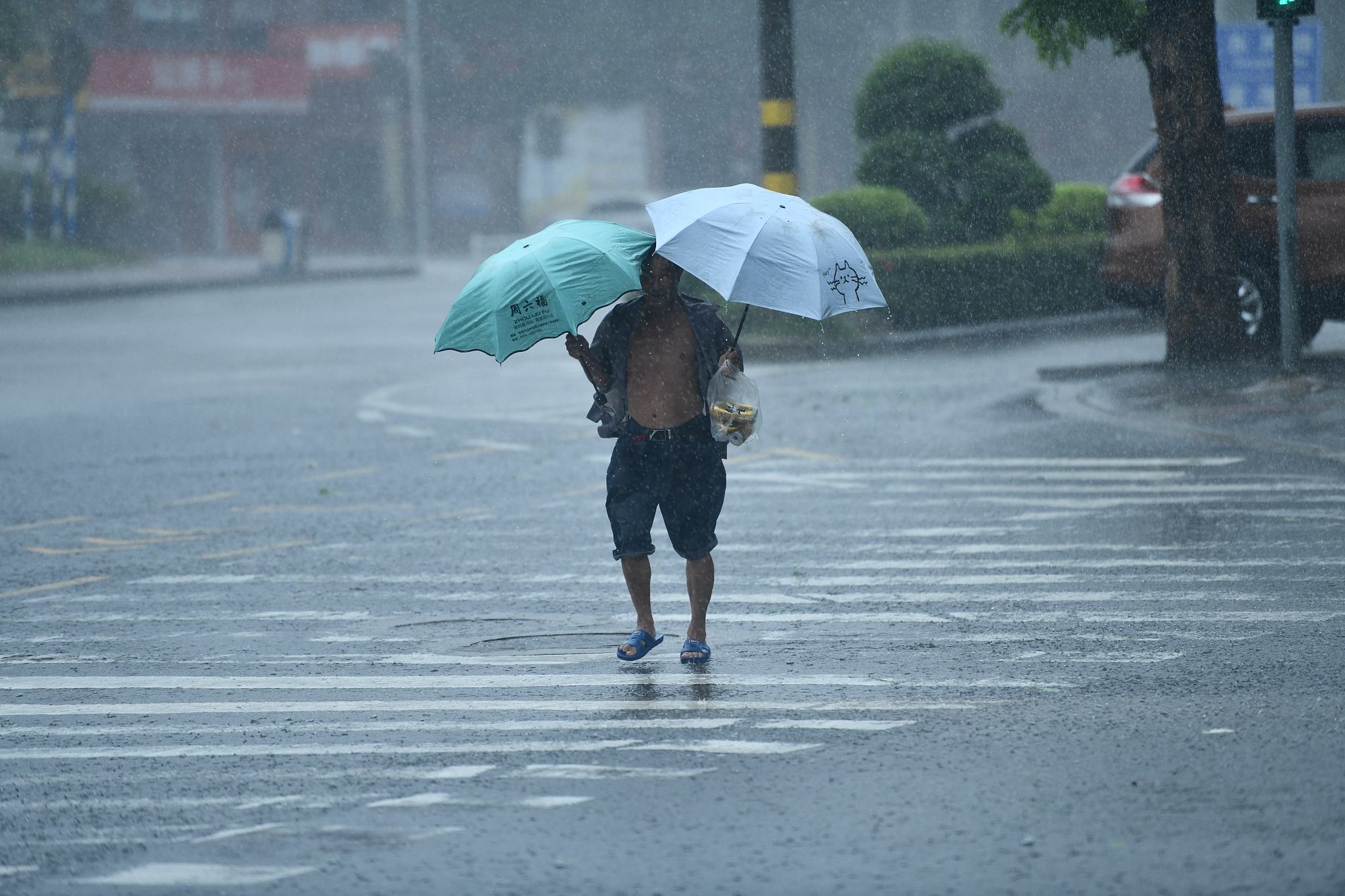 Typhoon Yagi made landfall in Qionghai City, south China's Hainan Province, as people braved the strong winds and heavy rain while traveling outdoors, September 6, 2024. /CFP