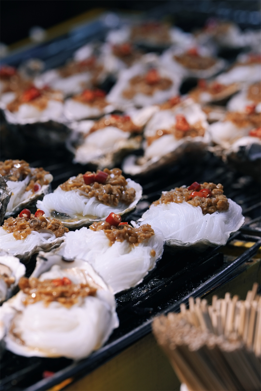 A nearby seafood market supplies fresh catches to the night market in Shenyang, Liaoning Province, August 19, 2024. /CGTN