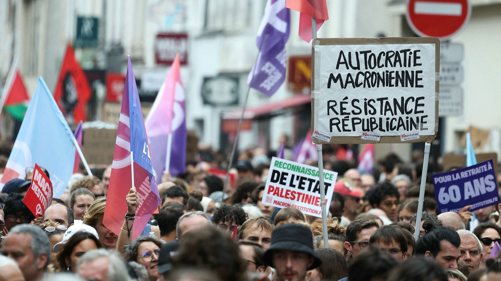 Protesters as seen during a rally at Place de la Bastille to demonstrate against French President Emmanuel Macron's choice of Michel Barnier as the new prime minister, Paris, September 7, 2024. /CFP