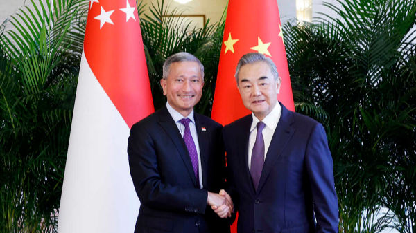 Chinese Foreign Minister Wang Yi (R), also a member of the Political Bureau of the Communist Party of China Central Committee, shakes hands with Vivian Balakrishnan, minister of foreign affairs for Singapore, in Beijing, China, September 9, 2024. /Chinese Foreign Ministry